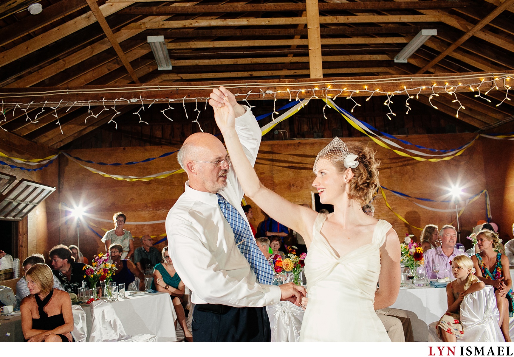 The bride and her father dances at the Hampton Barn
