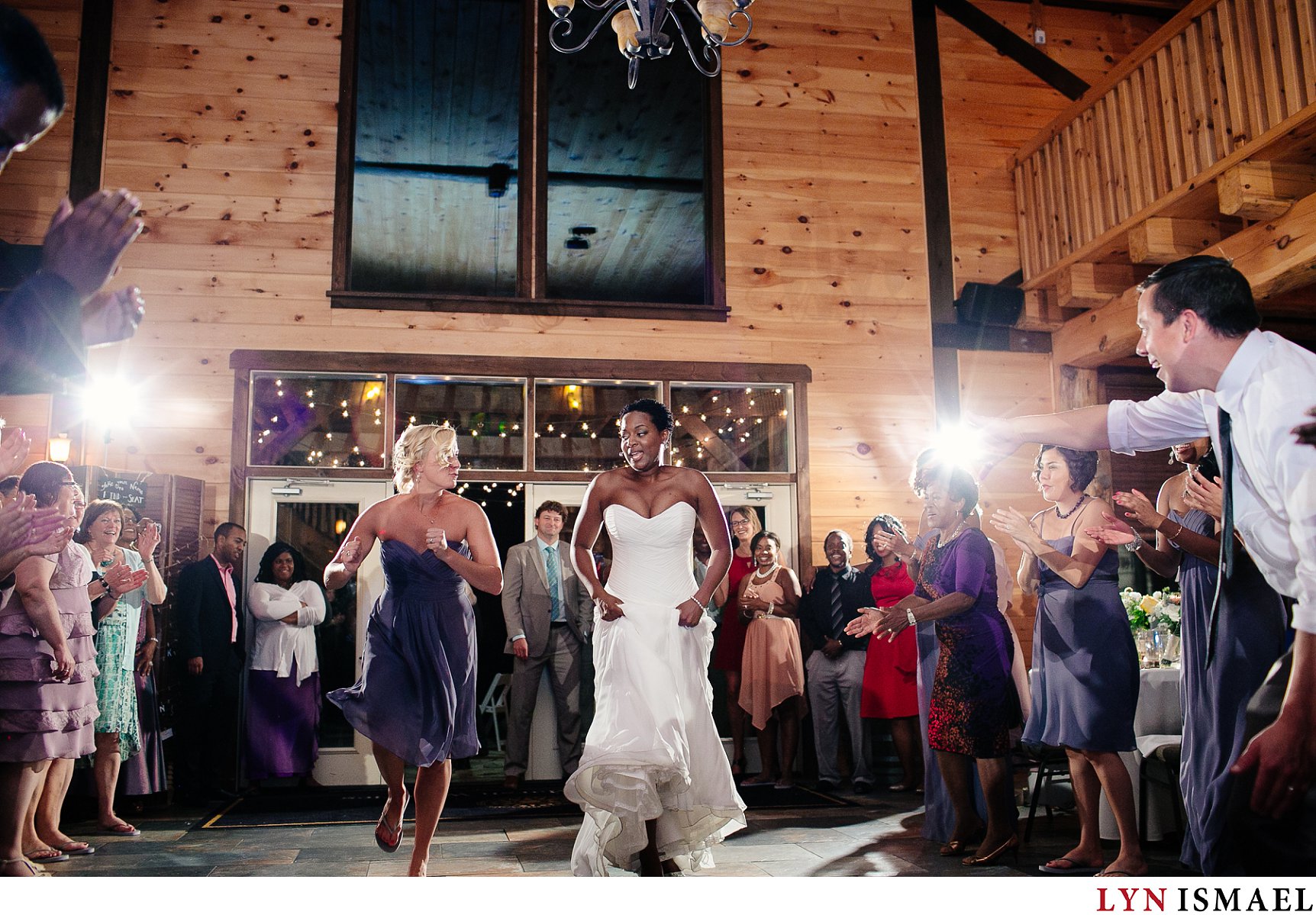Bride and her maid of honour dancing to the running man.