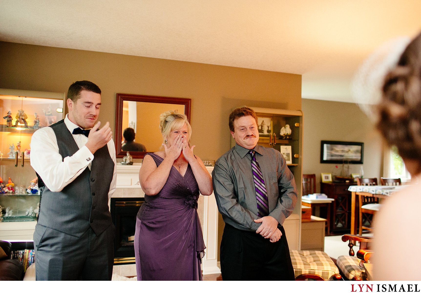 An emotional reaction from the bride's family upon seeing the bride for the first time.
