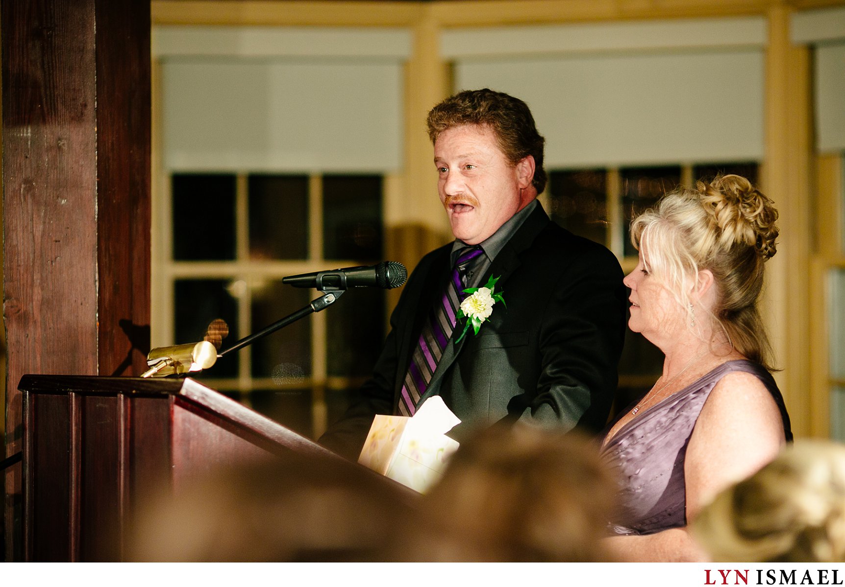 The father of the bride delivers a speech.