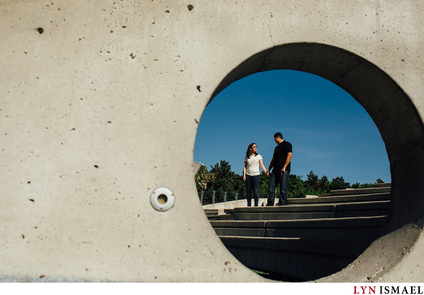 Using shapes for composition outside the Ontario Science Centre for a couple's engagement session.