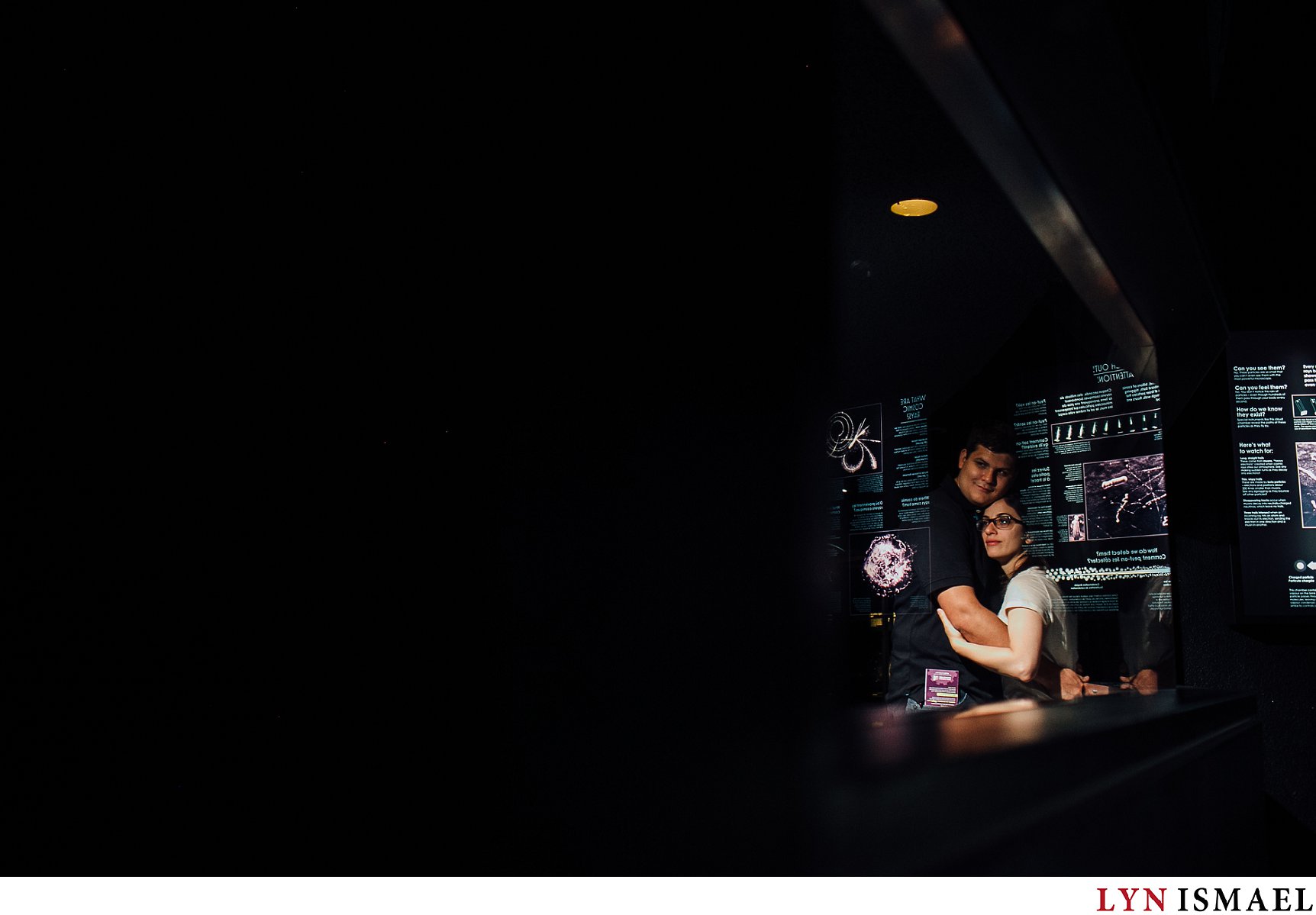 Inside the Ontario Science Centre for a couple's engagement session.