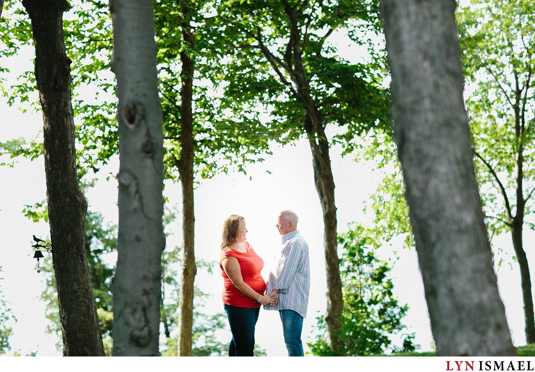 A couple poses for their engagement session in Bayfield, Ontario.