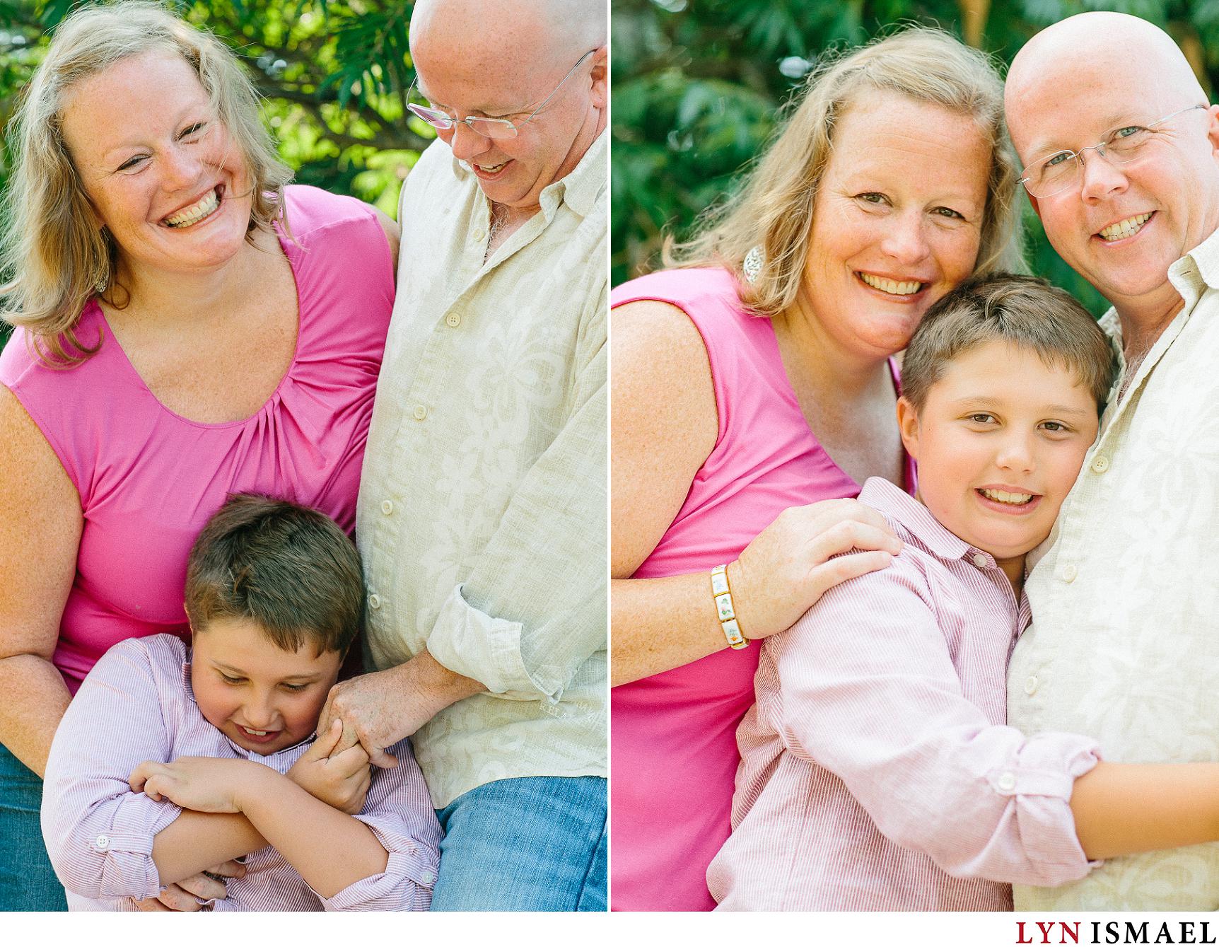 A couple with their son as they pose for their engagement session in Bayfield, Ontario.