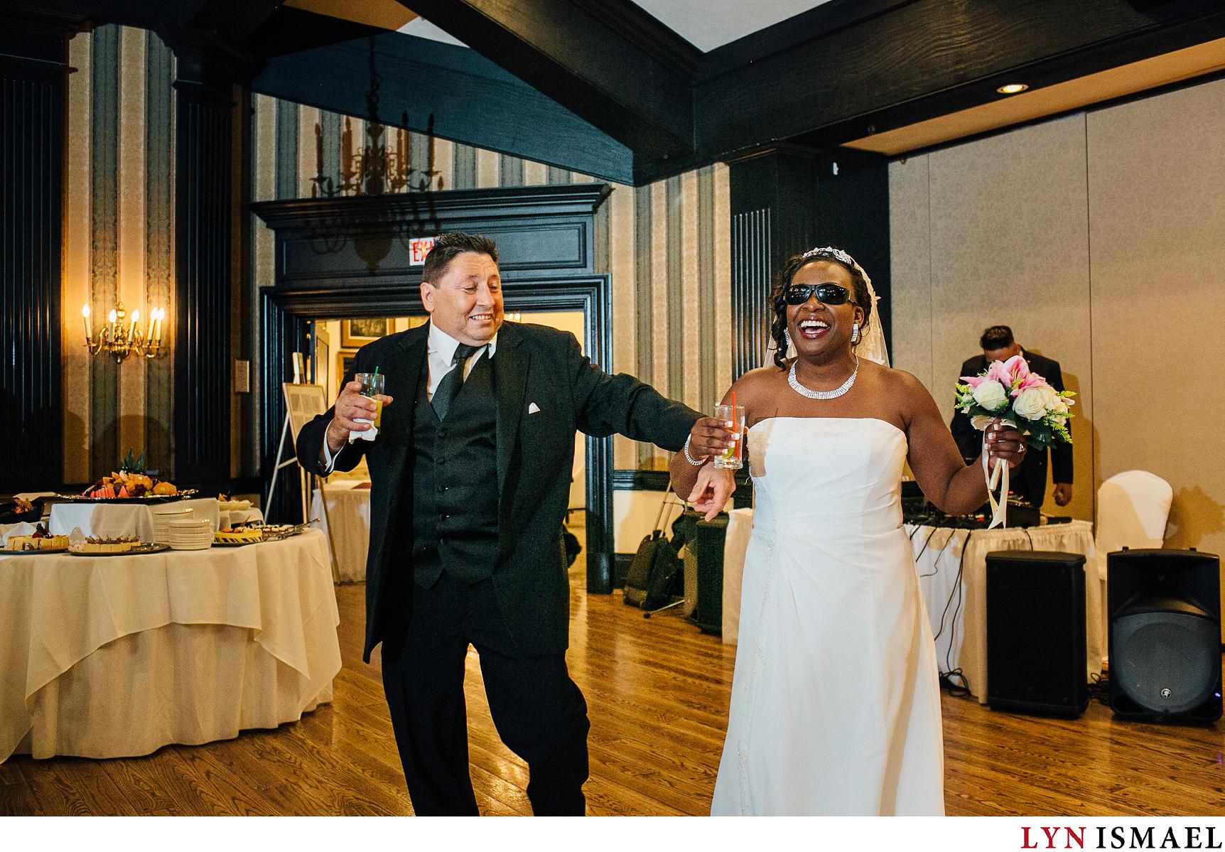 Bride and groom's enters their wedding reception at the Old Mill Inn in Toronto