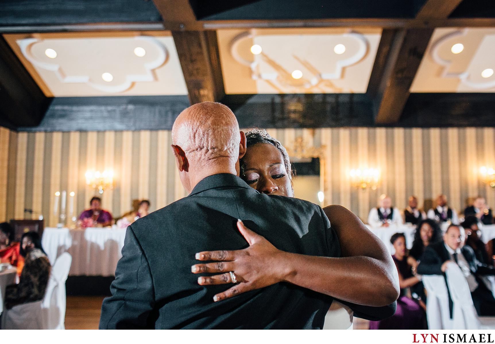Bride becomes emotional dancing with her uncle at their wedding reception