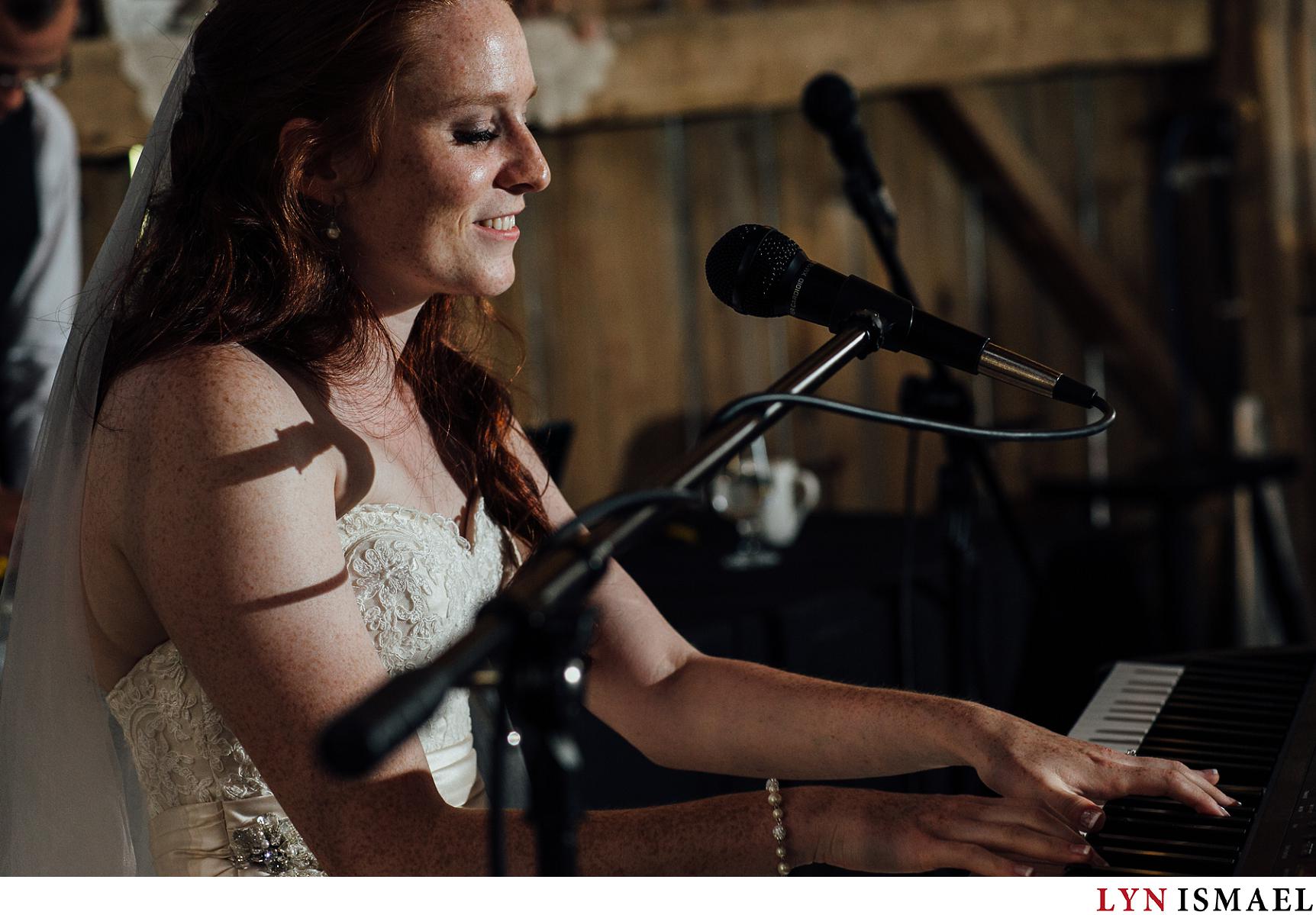 The bride plays a song for the groom