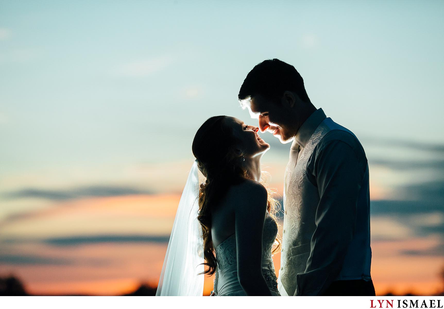 A sunset portrait of the bride and groom