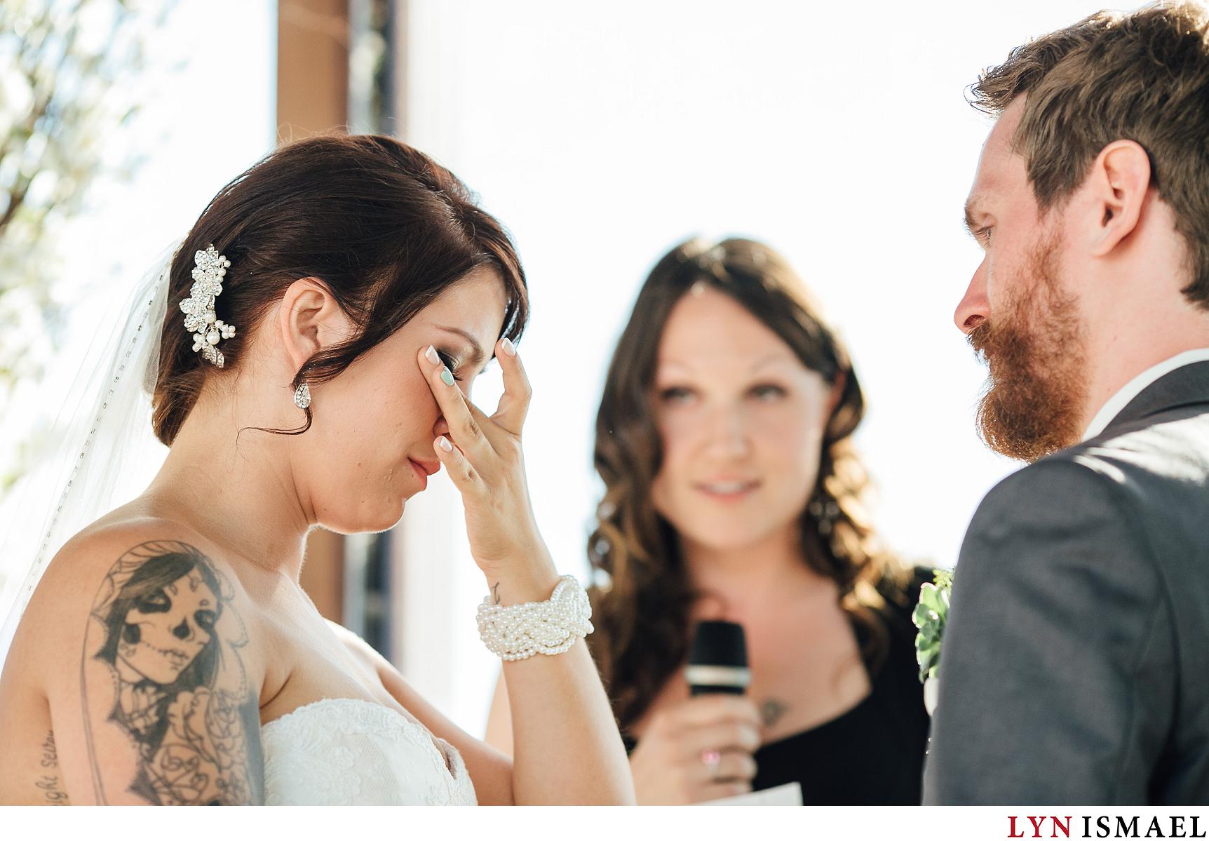 Bride cries at a wedding ceremony at a Waterloo Region wedding.