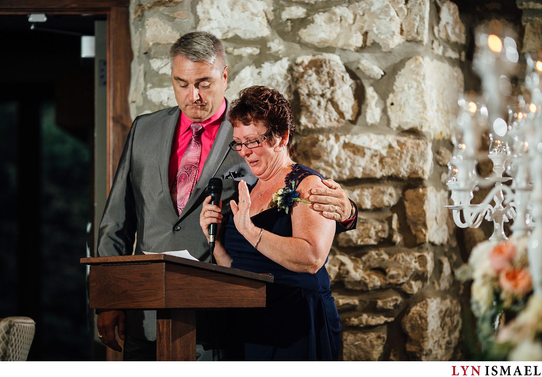 A mother of the groom becomes emotional at her speech at her son's wedding reception.