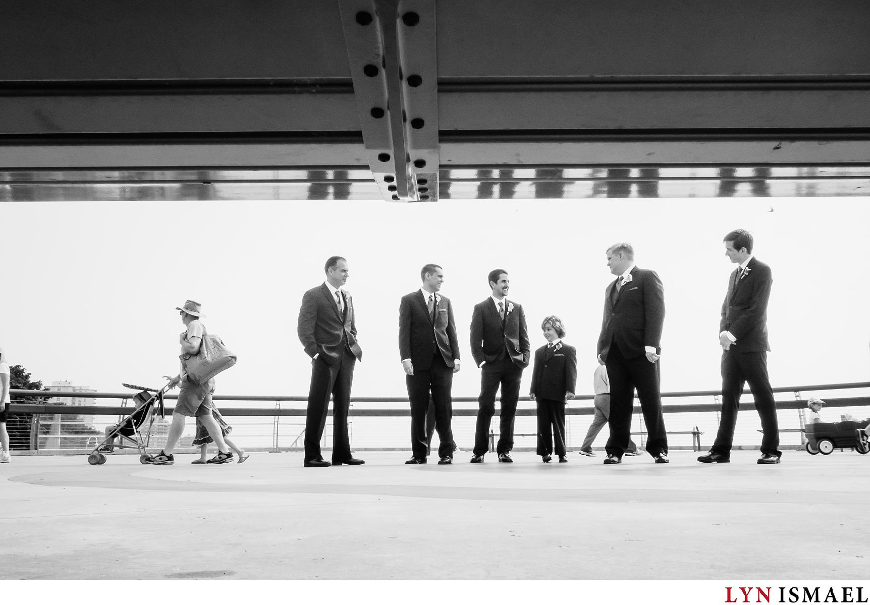 portrait of the groom and his groomsmen at Brant Street Pier