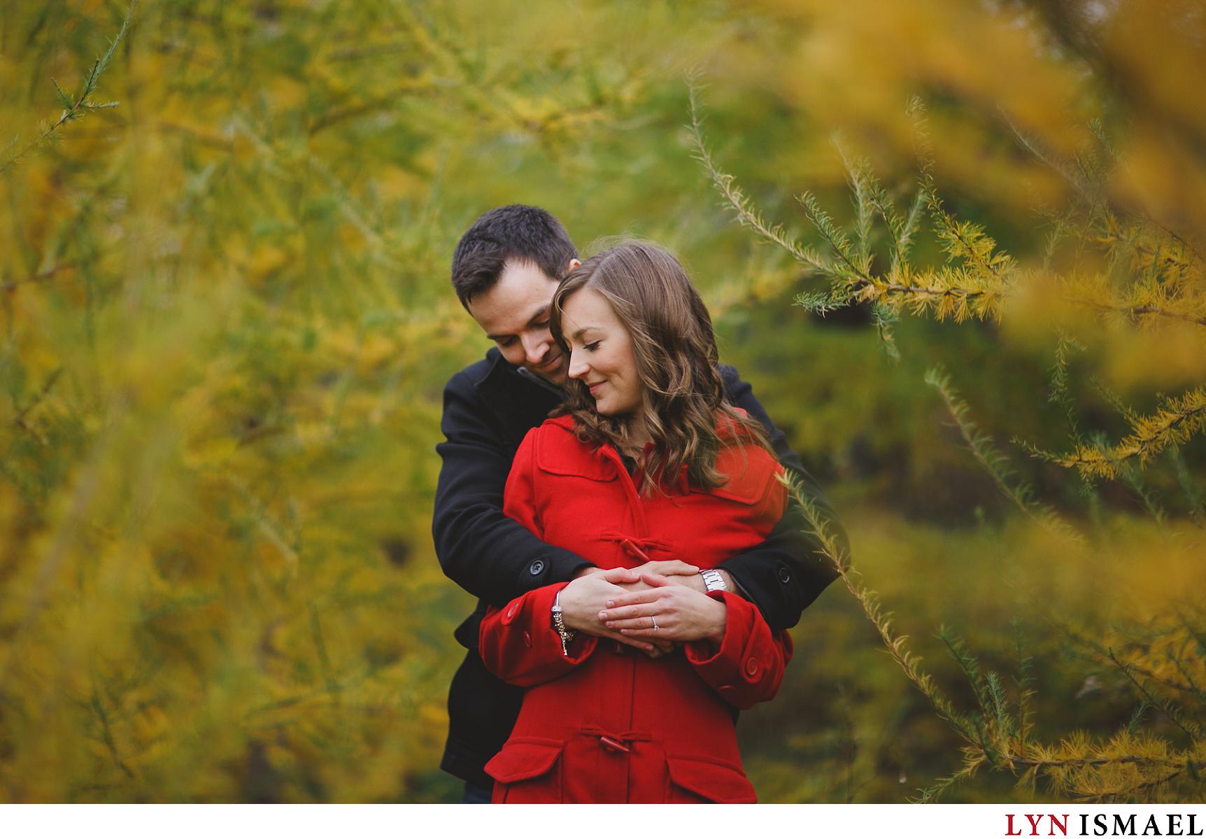 A couple cuddles for their engagement pictures photographed by a modern Guelph photographer