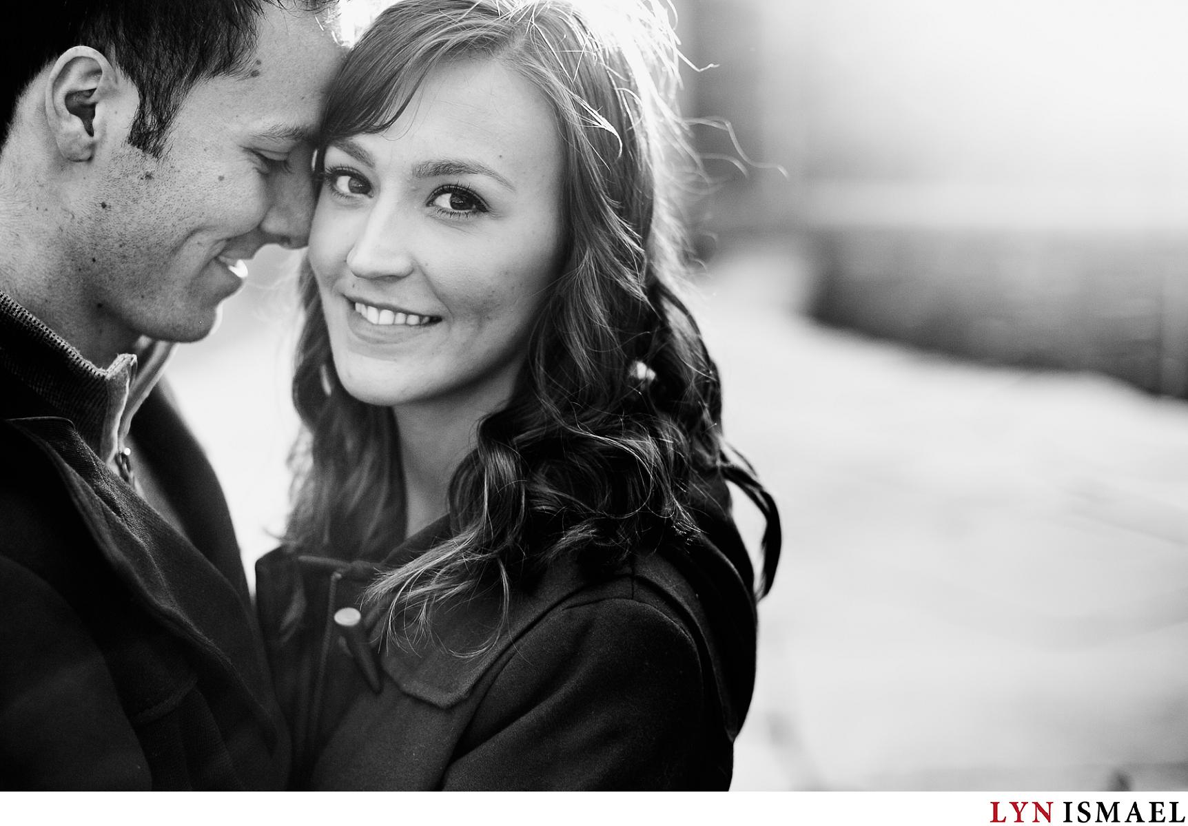 Black and white portrait of an engaged couple photographed by a modern Guelph photographer