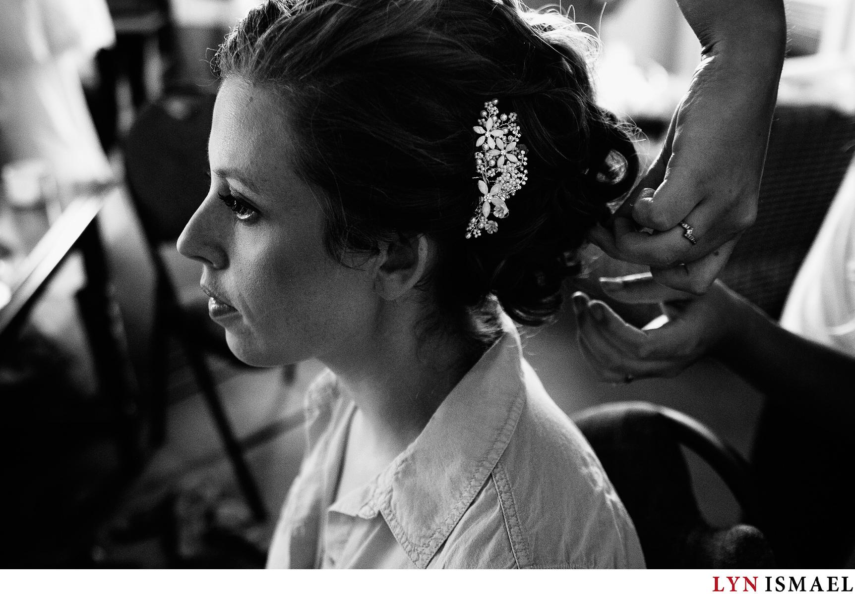 Beautiful bride gets ready before her wedding ceremony.