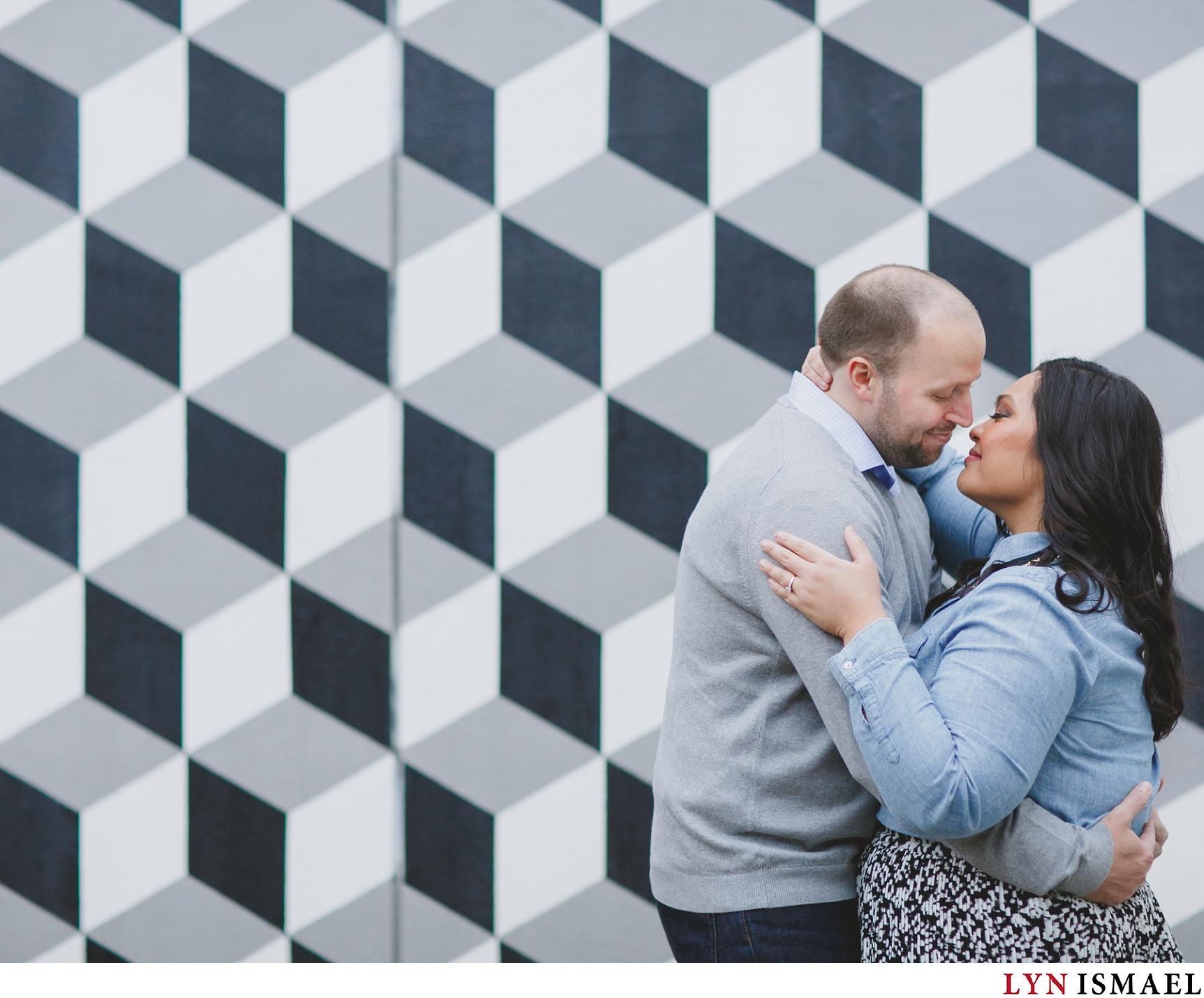 A graphic backdrop for an engagement session at Mississauga Civic Centre