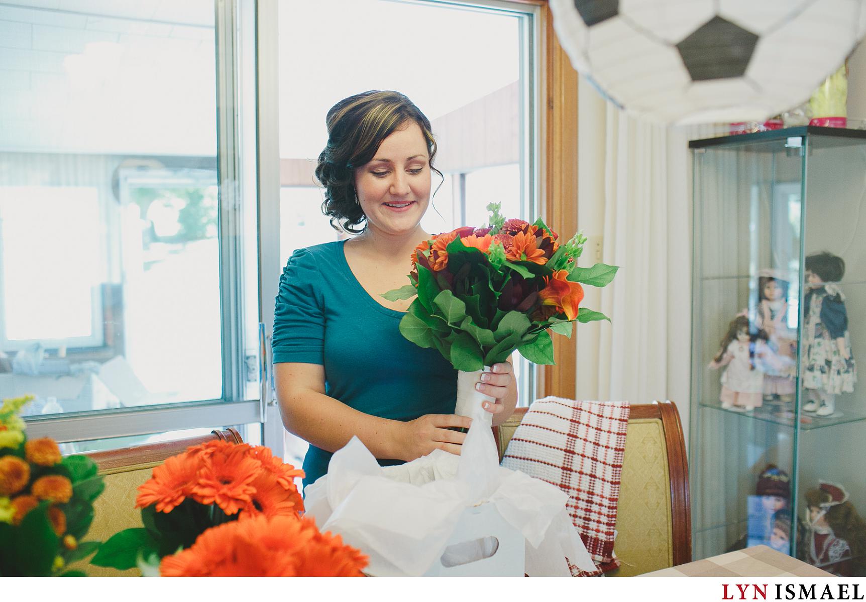 Bride sees her wedding bouquet for the first time.