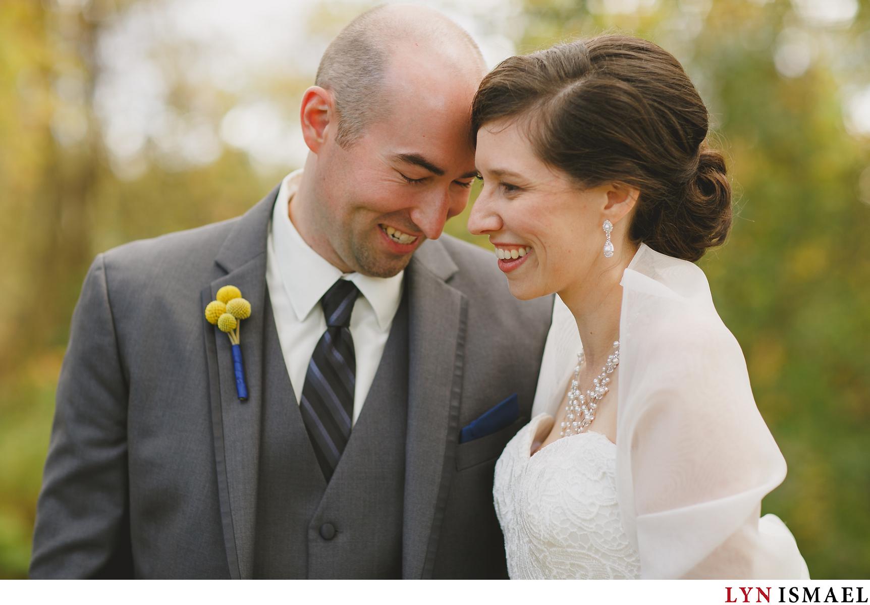 A beautiful natural portrait of the bride and groom in the fall.