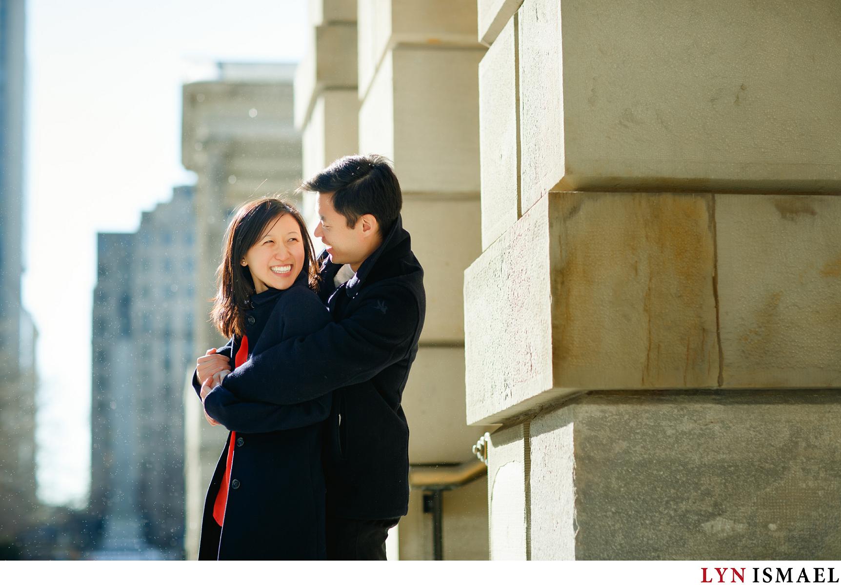 An Asian couple had their engagement session in front of Osgood Hall, a building close to Nathan Phillips Square in Toronto, Ontario.