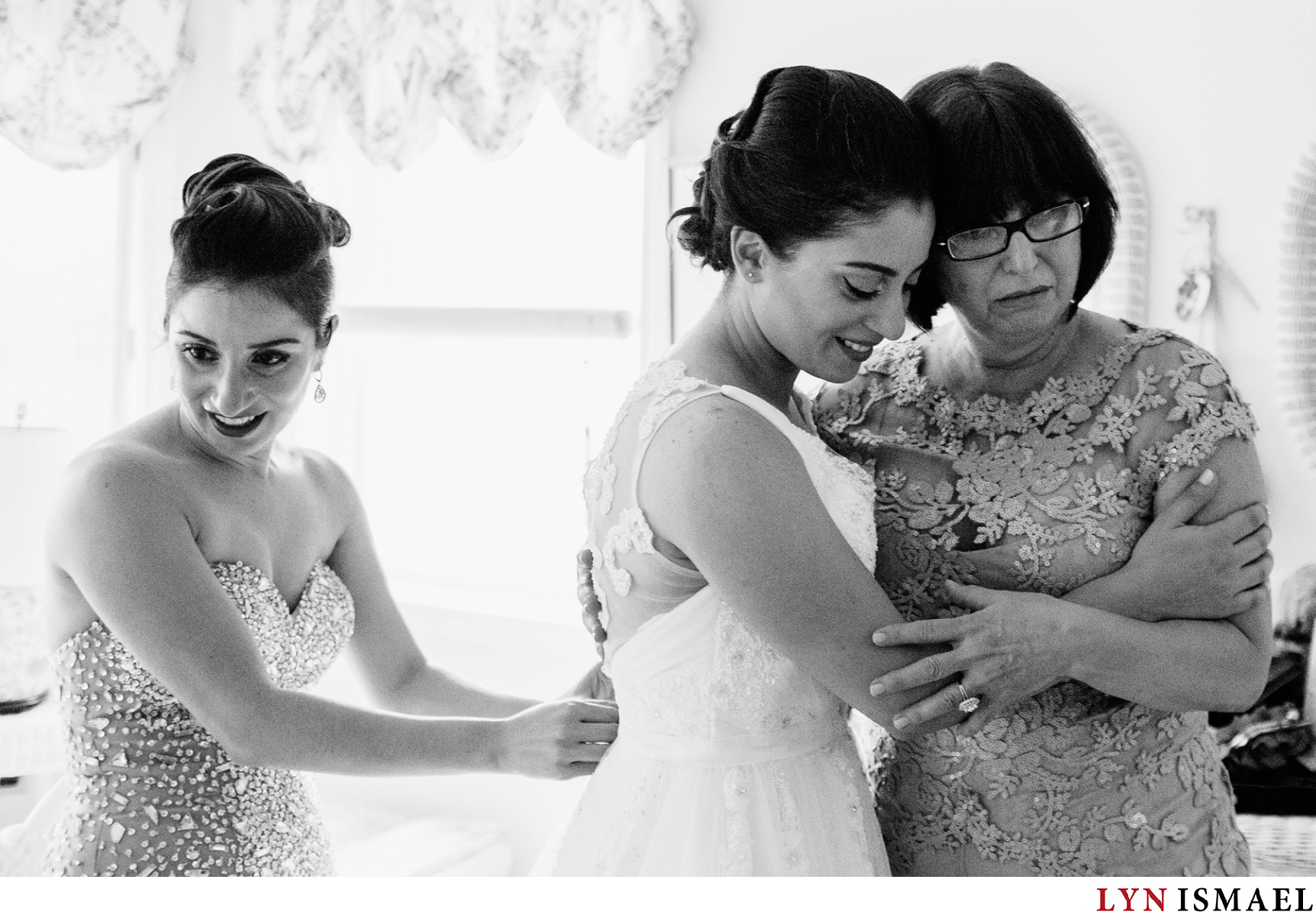 Mother of the bride becomes emotional upon seeing her daughter dressed in her wedding gown