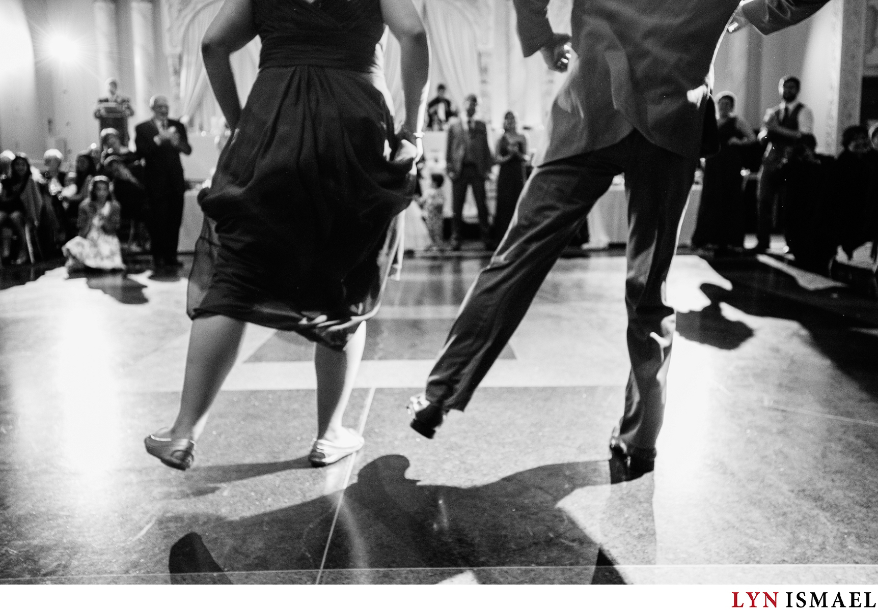 A bridesmaid and a groomsmanshowing off their dance moves as they were introduced at a wedding reception in Vaughan, Ontario.
