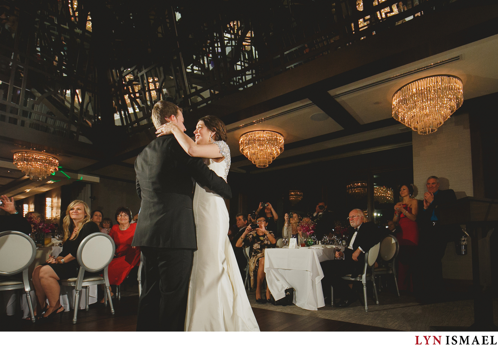 The bride and groom's first dance inside the Grandview Room of Whistle Bear Golf Club.