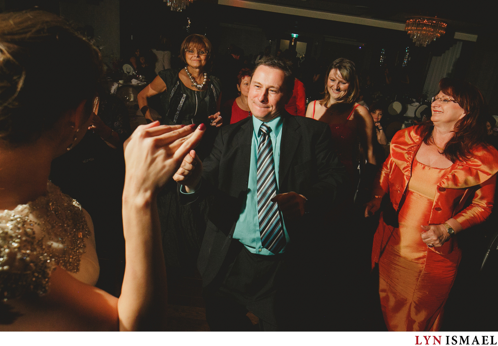 Polish wedding guests dance to Polish pop tunes at a wedding at Cambridge's Whistle Bear Golf Club.