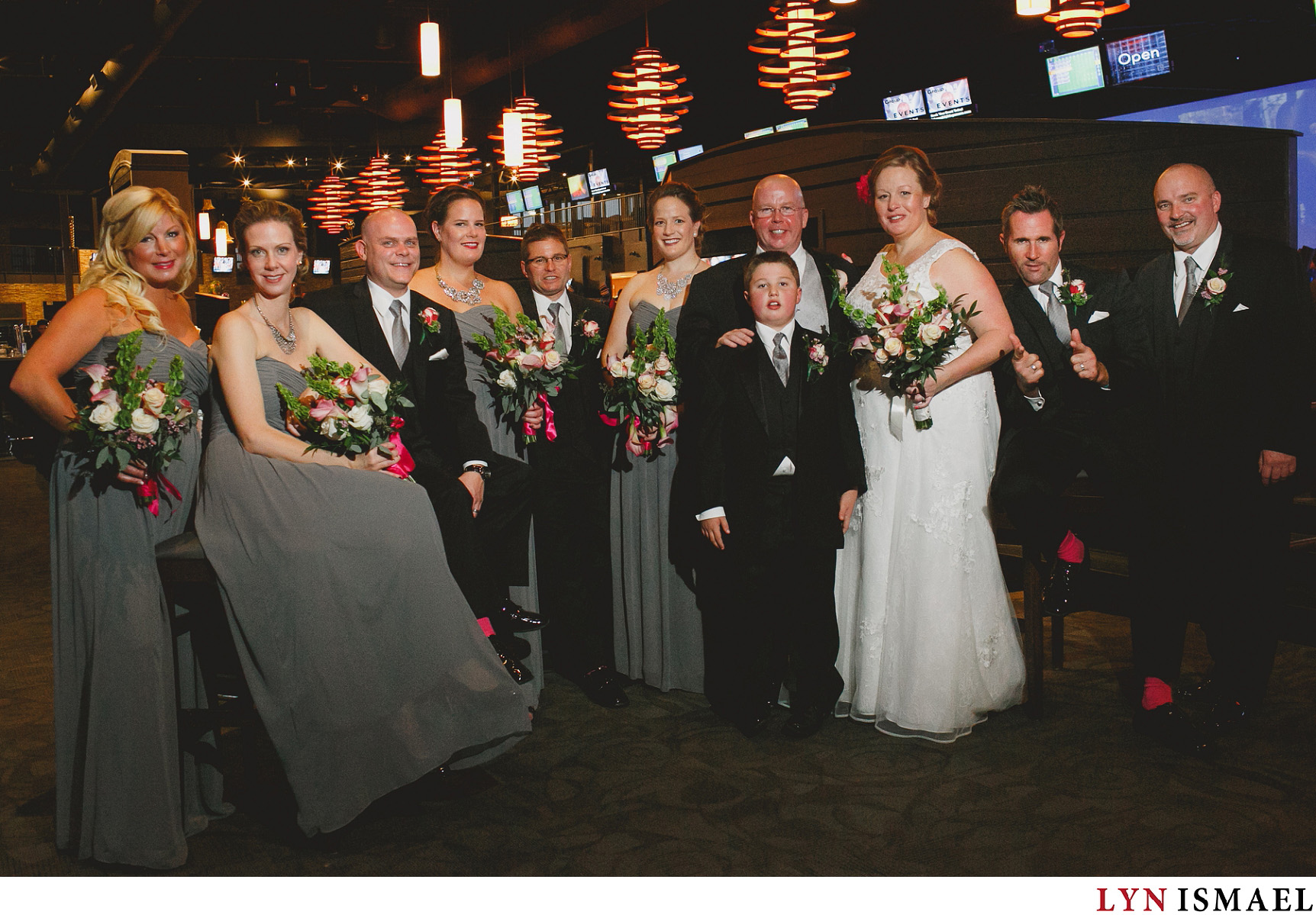 Wedding party photo at Kingpin Bowling Alley in Kitchener, Ontario.