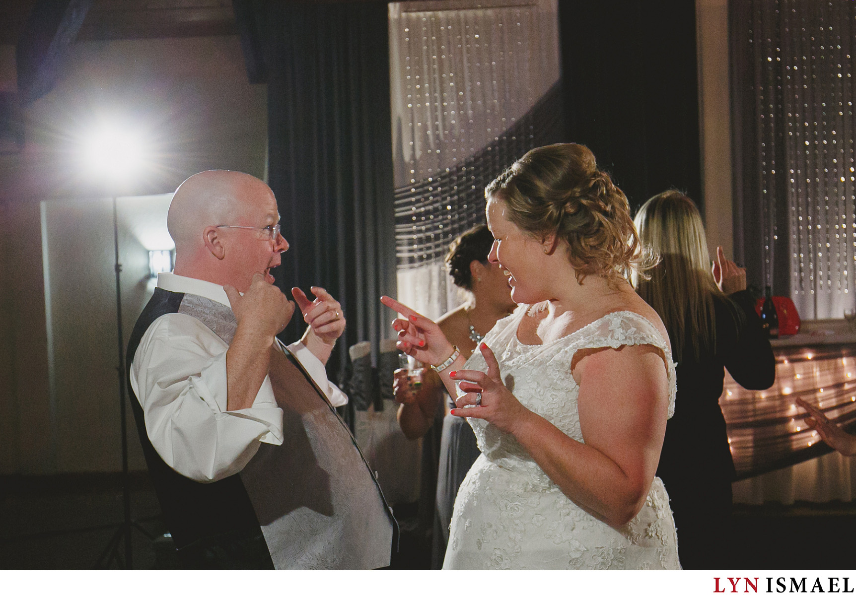 Newlywed couple enjoying their reception at Concordia Hall in Kitchener.