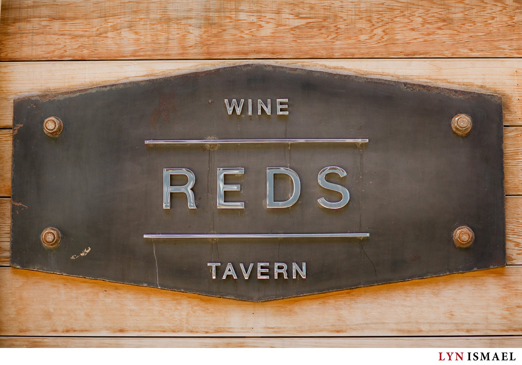 Reds Wine Tavern plaque