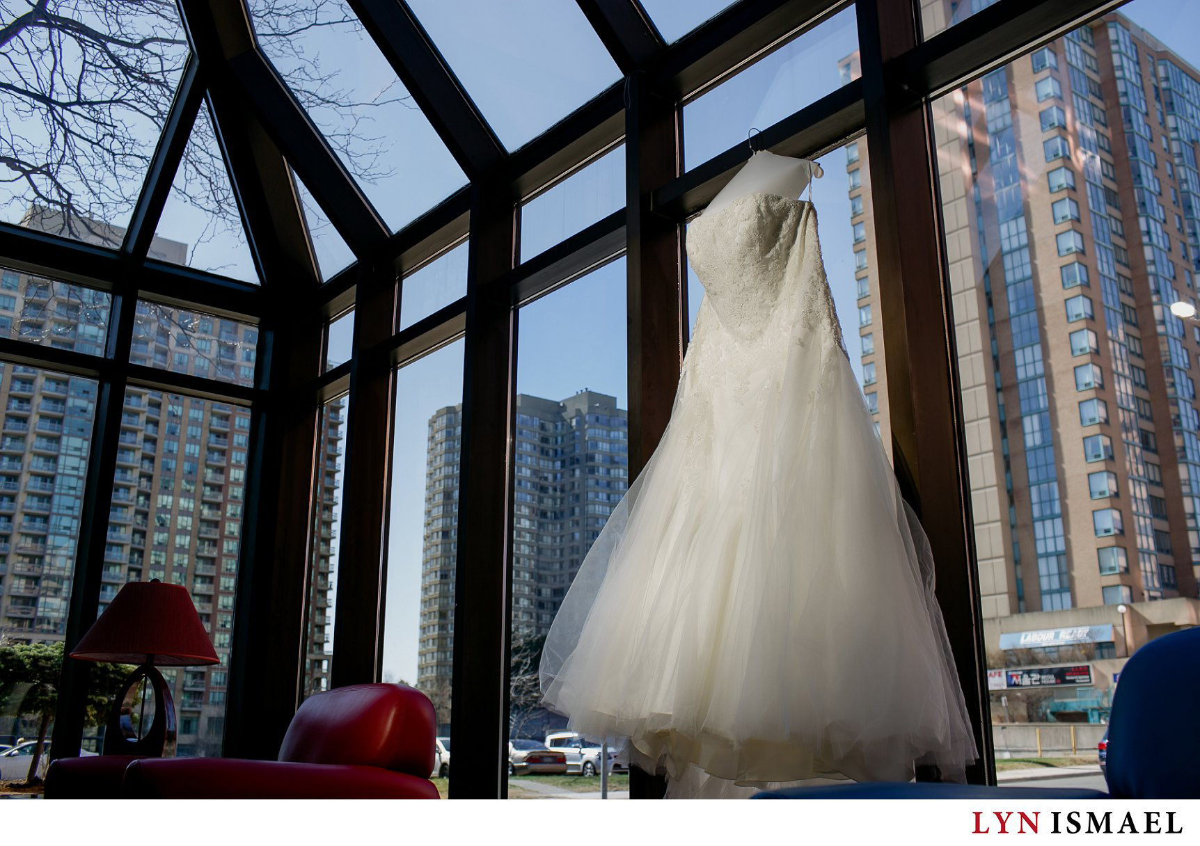 Bride's dress hanging at the Novotel Hotel's lobby in Mississauga.