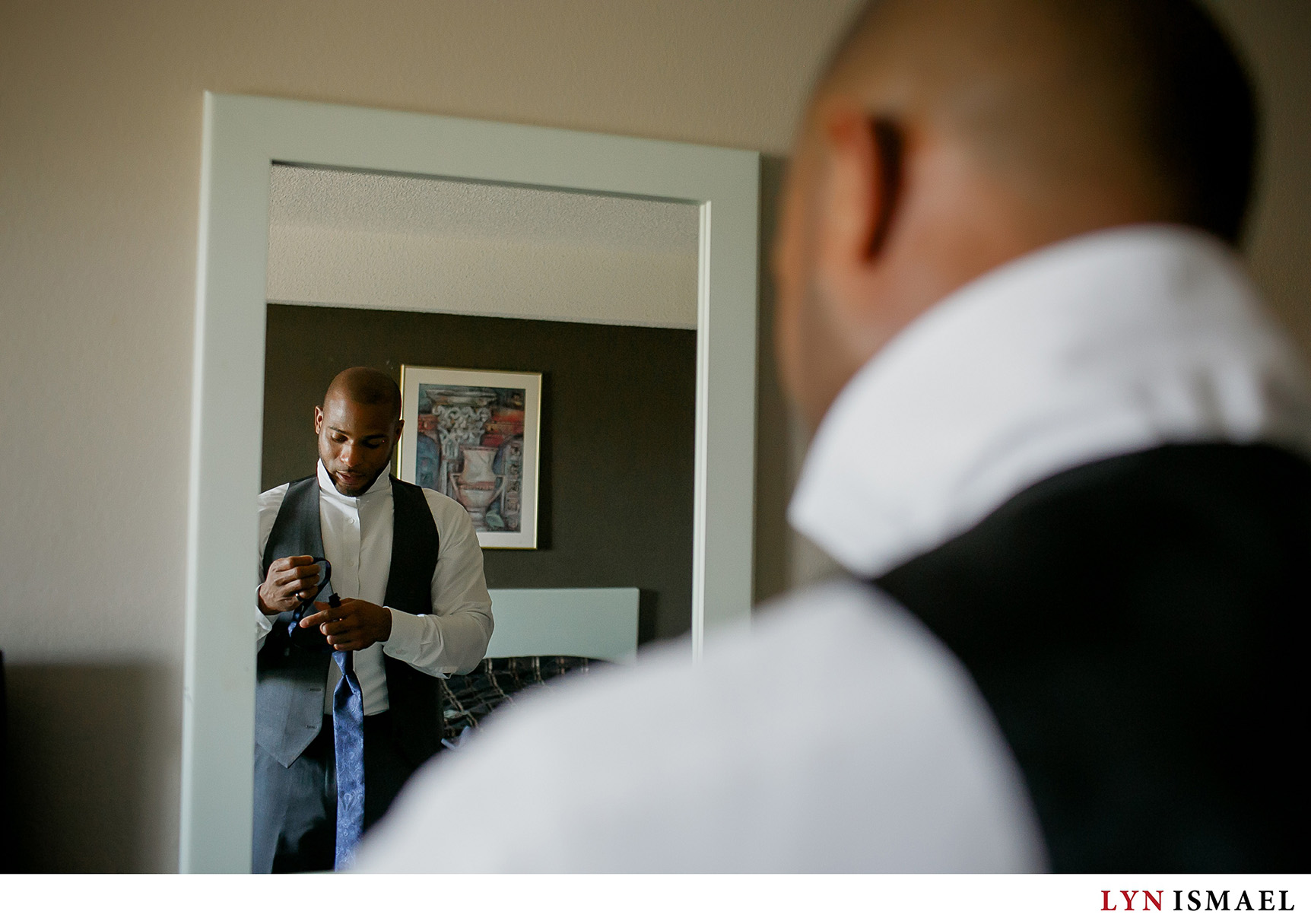 Groom gets ready before his wedding at Chateau Le Jardin