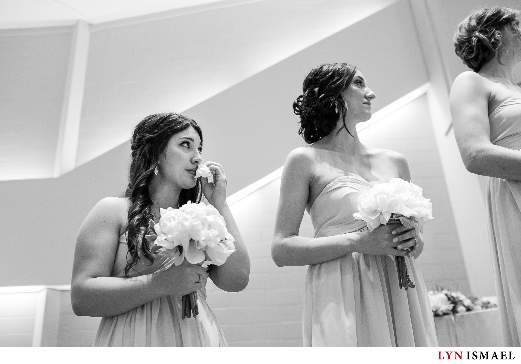 Bridesmaid become teary at a wedding in Listowel, Ontario.