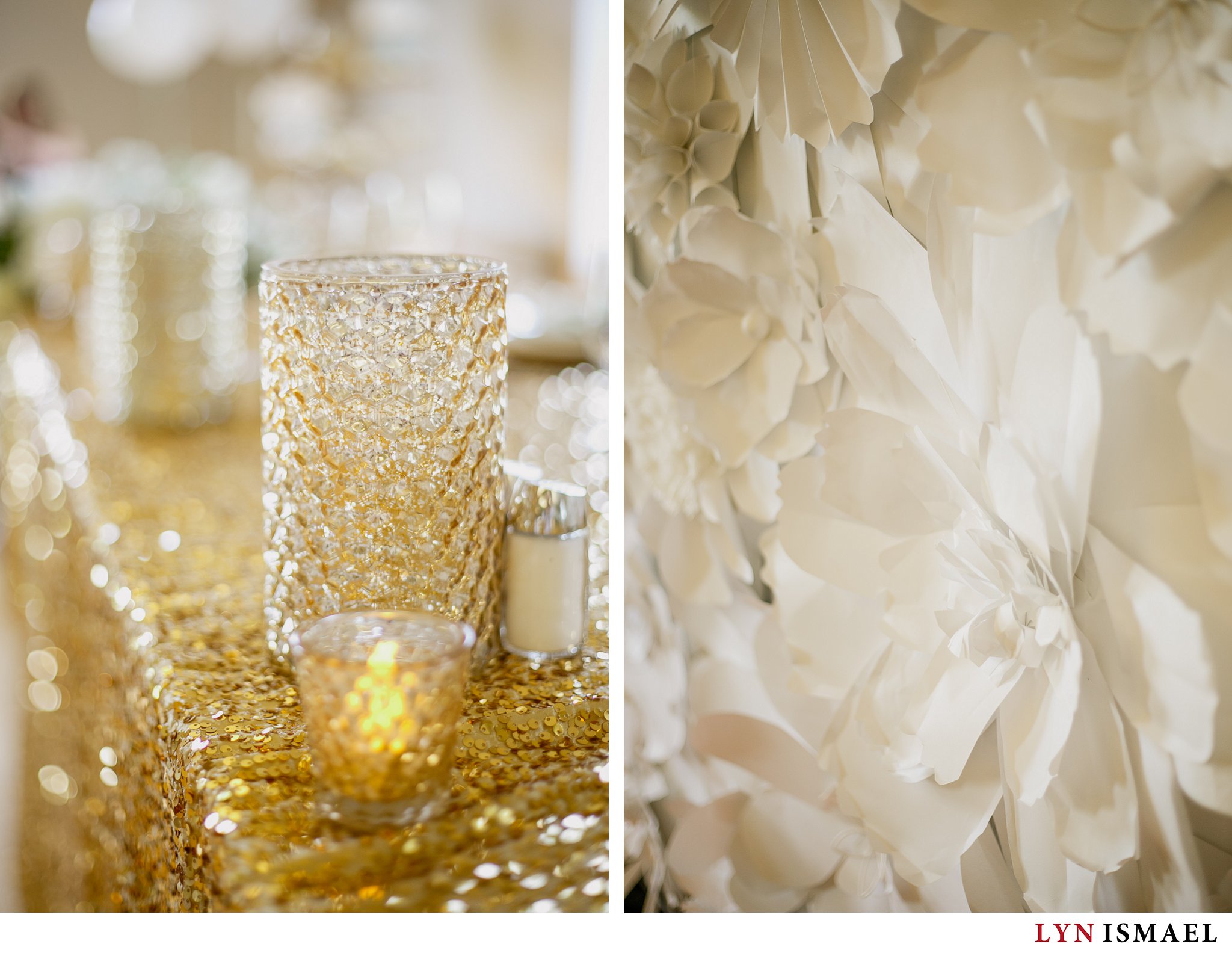 gold sequin head table and white paper floral backdrop