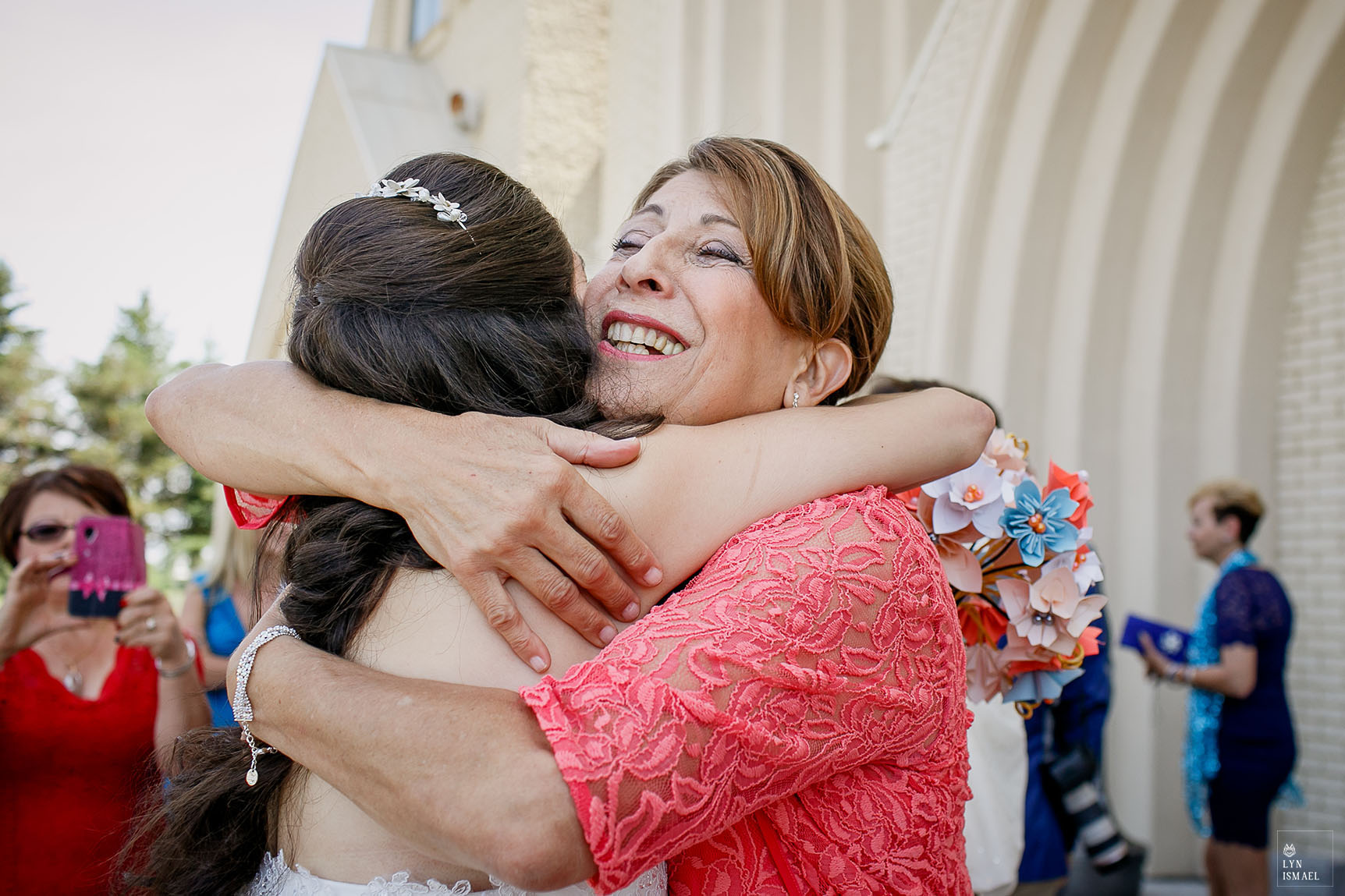 Mother of the Bride hugs her daughter