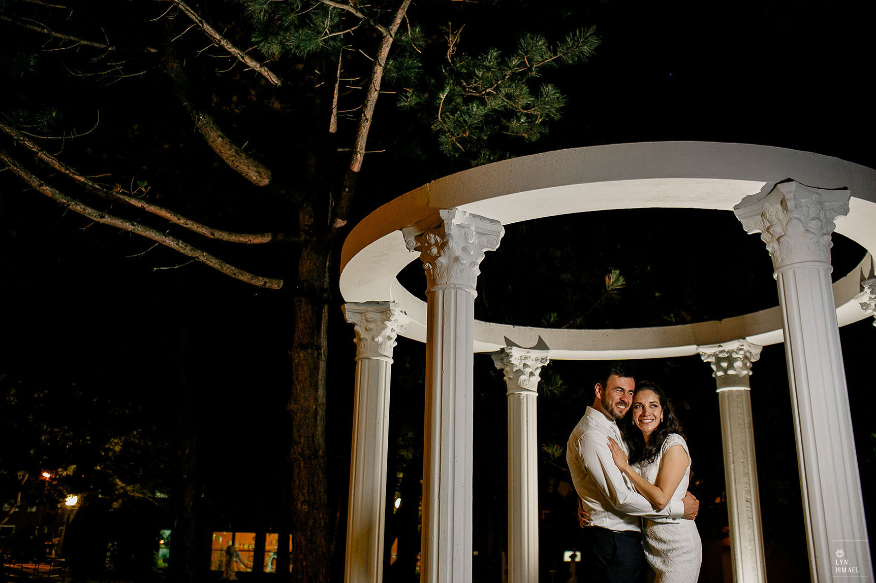Night portrait of a newlywed couple outside Columbus Event Centre