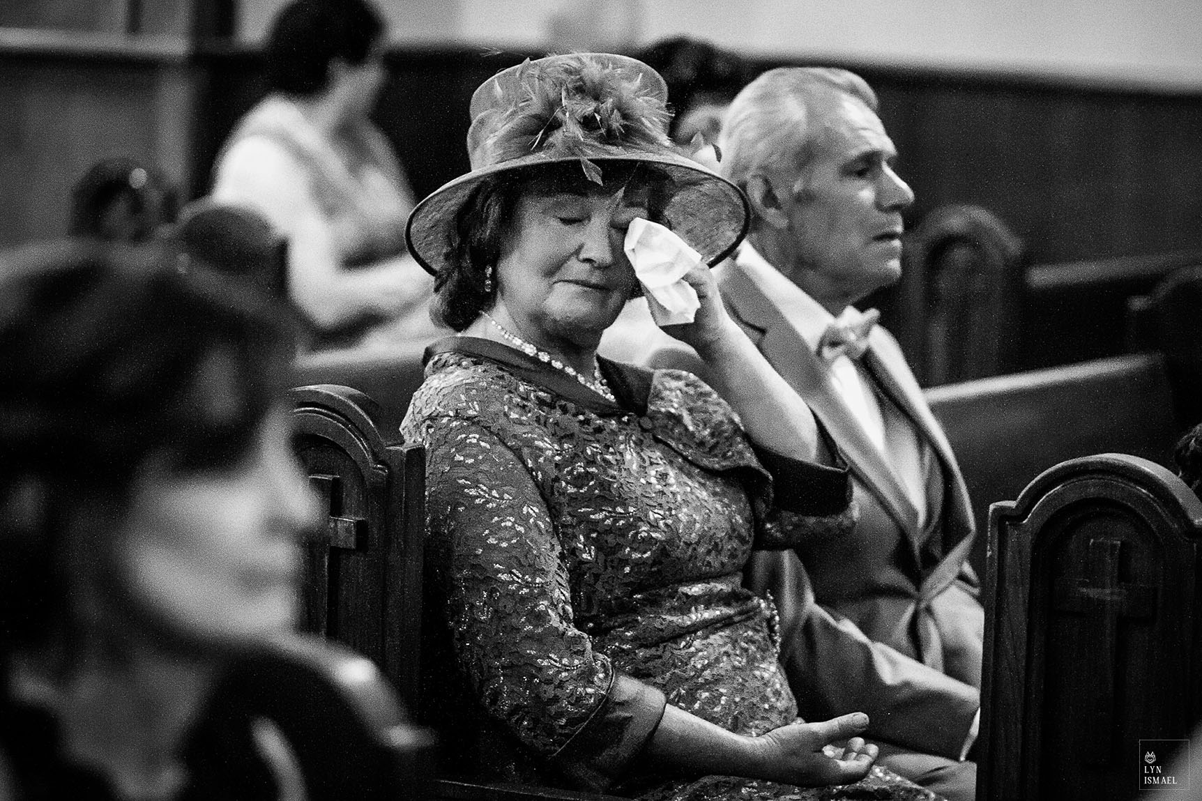 Mother of the bride becomes emotional as she watches her daughter marry at a wedding ceremony in Cambridge, Ontario.