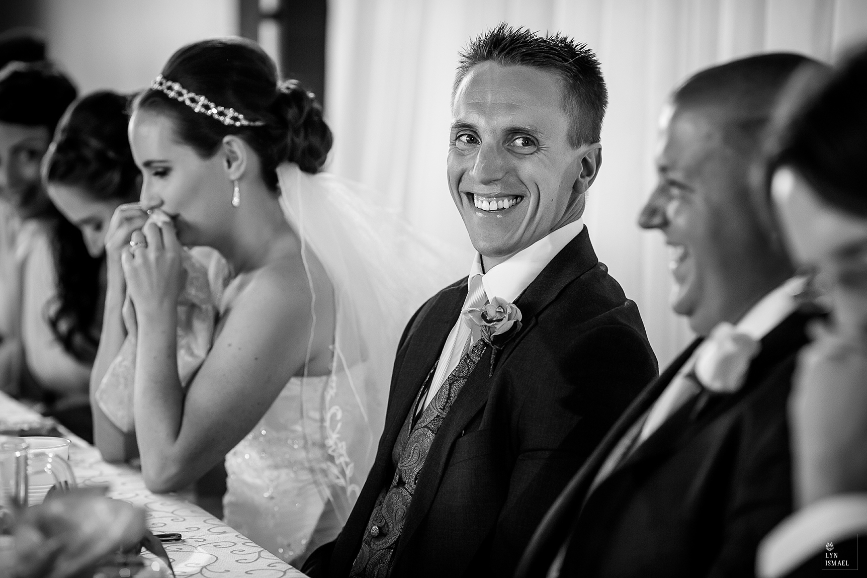 Groom reacts to his father's speech at his wedding reception at The Lakeview by Carmen's in Hamilton, Ontario.