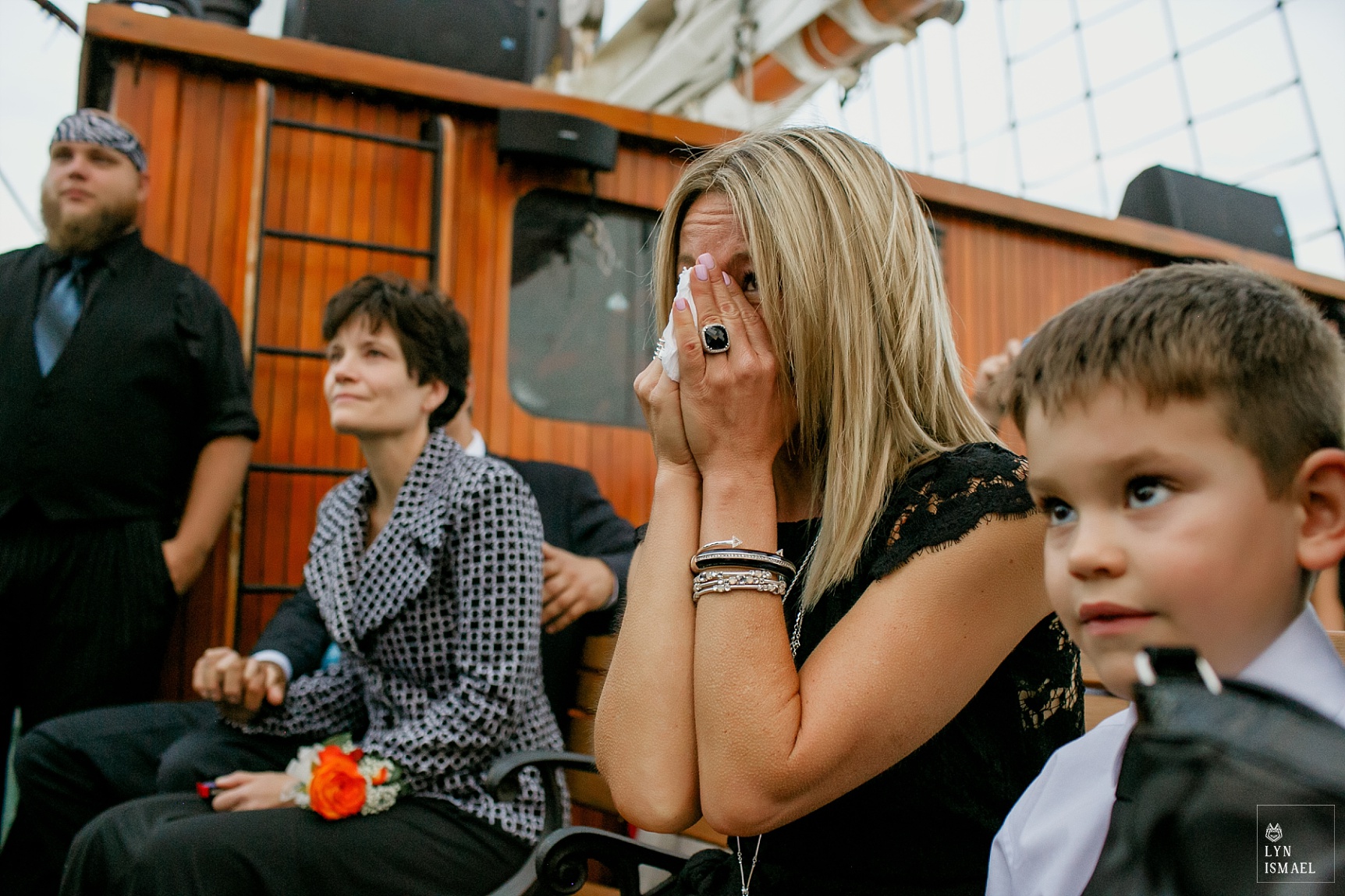 Groom's aunt becomes really emotional listening to the bride and groom's vows aboard the Empire Sandy tall ship.