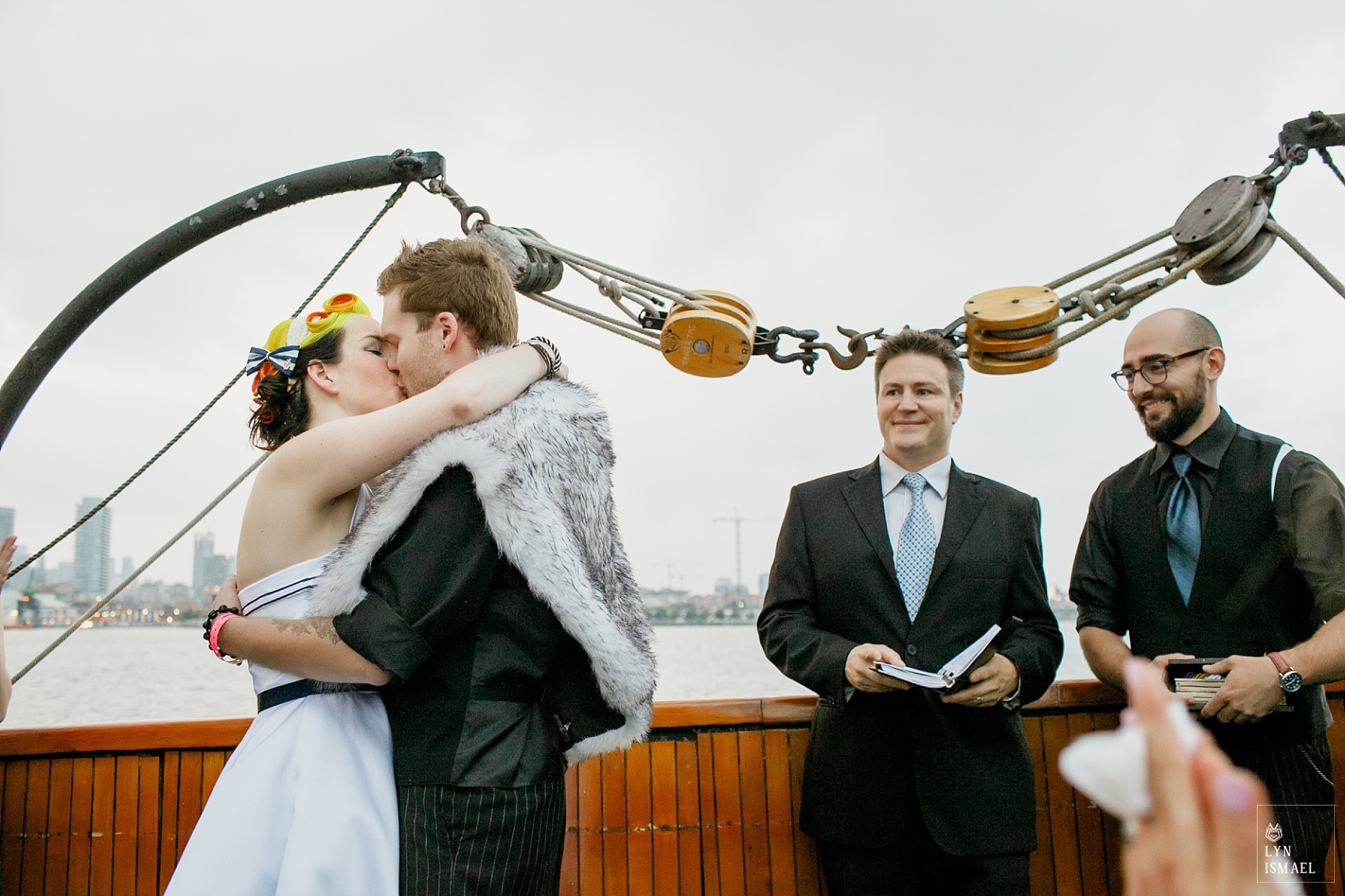 Bride and groom's first kiss on board the Empire Sandy.