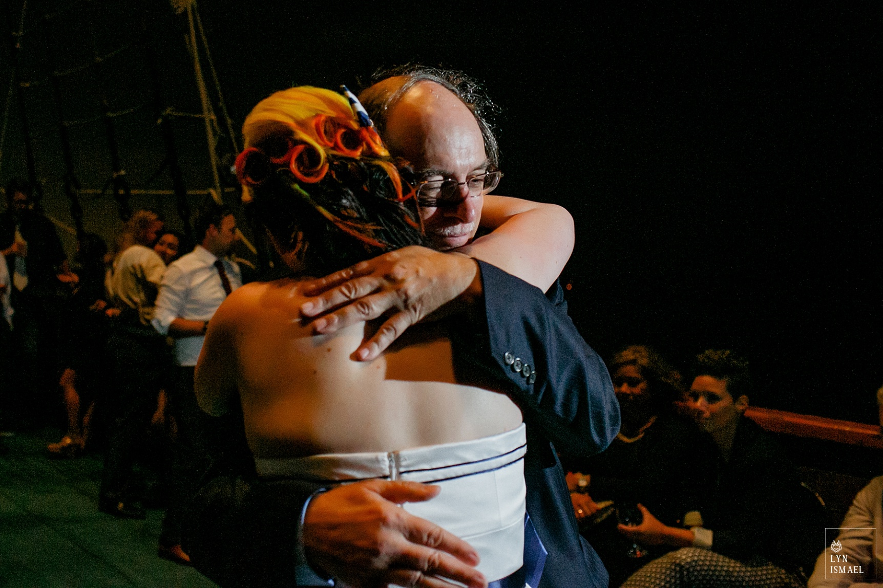 Bride embraces her father