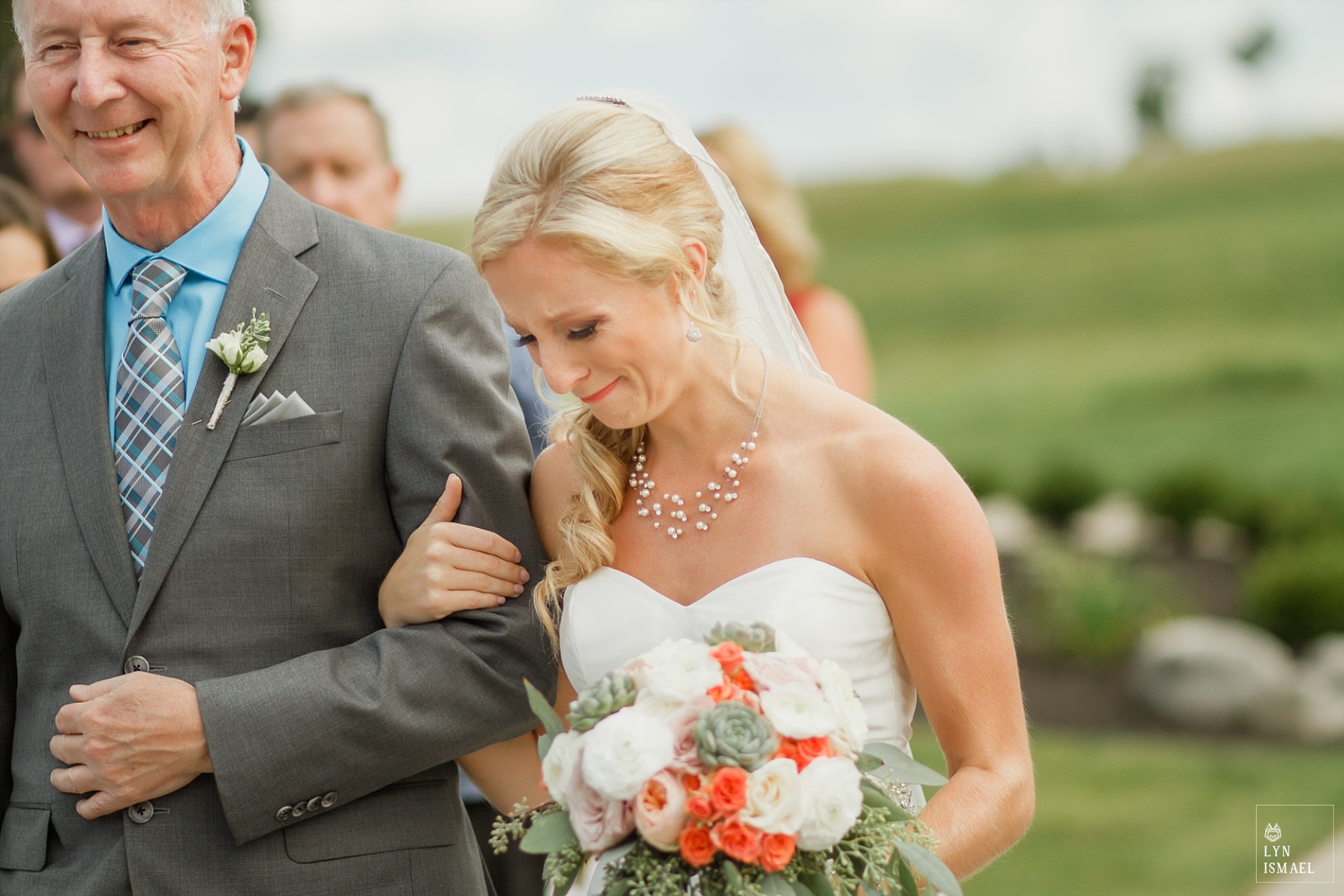 Bride becomes emotional walking down the aisle