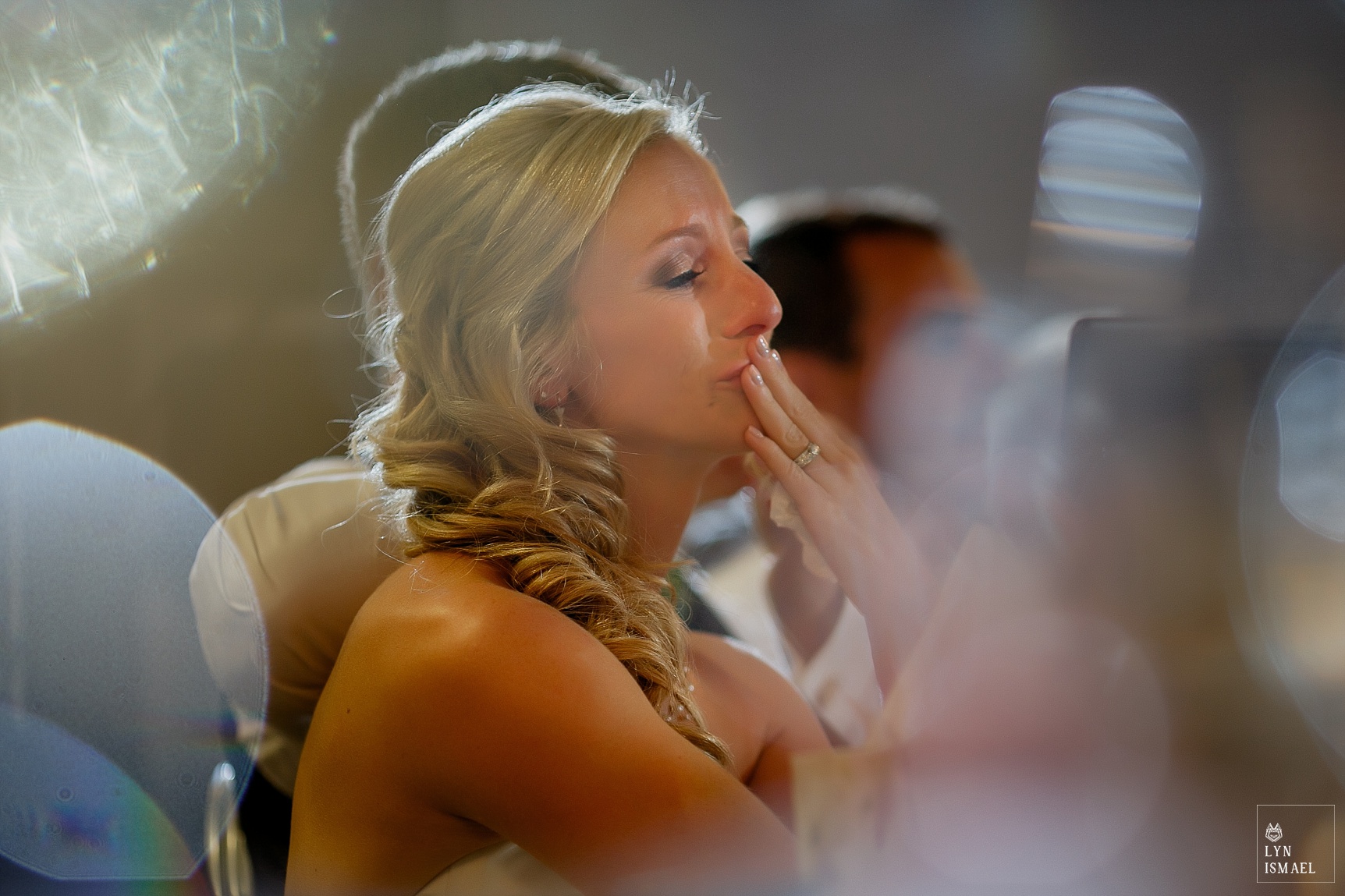 Bride tears up at her wedding reception