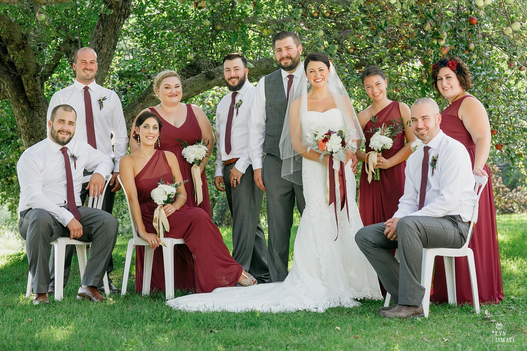 Wedding party photos at Steckle Heritage Farm, bridesmaids wearing burgundy dresses