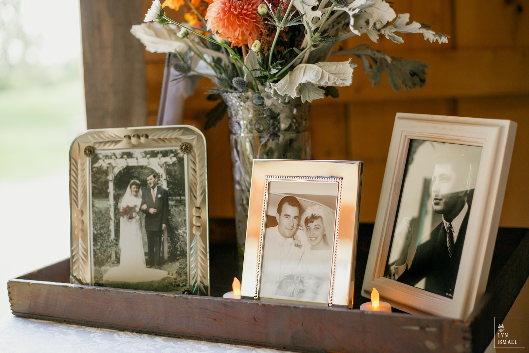 Portraits of an older generation displayed at a wedding at Steckle Heritage Farm