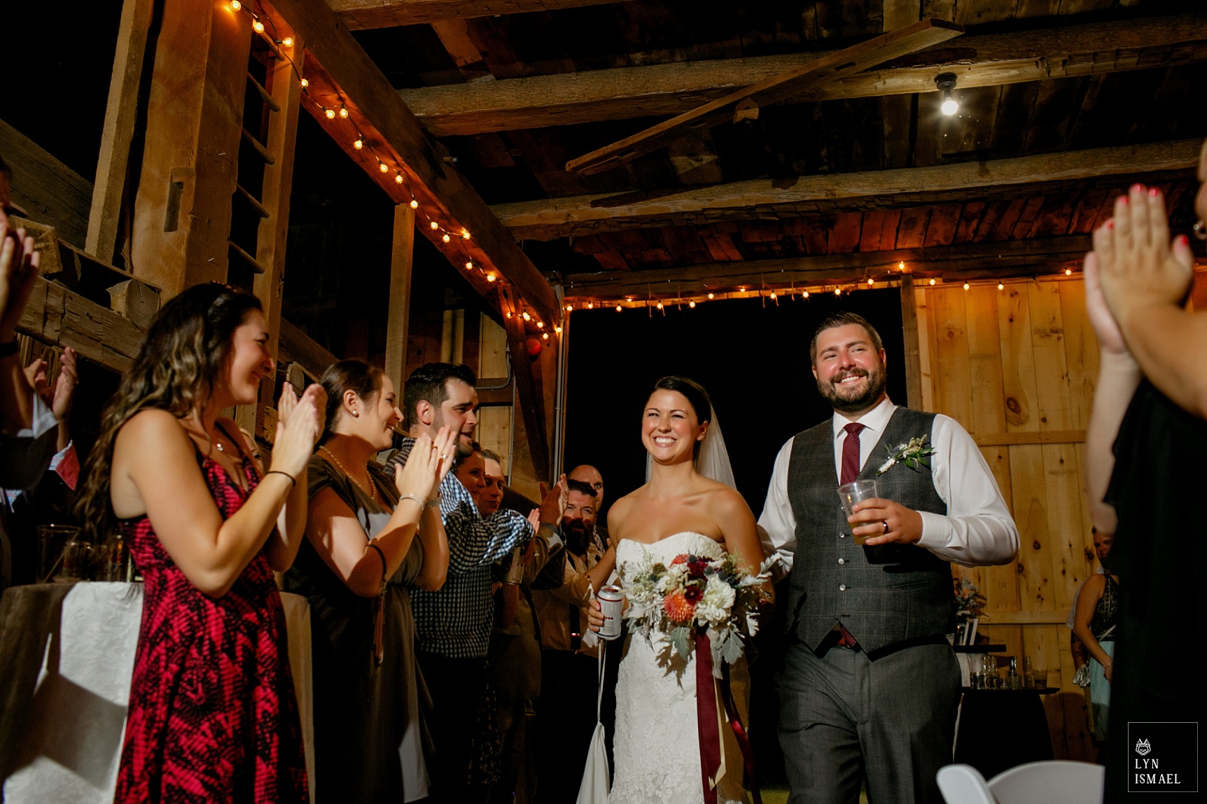 Bride and groom is introduced as husband and wife at their wedding reception at the Steckle Heritage Farm's barn