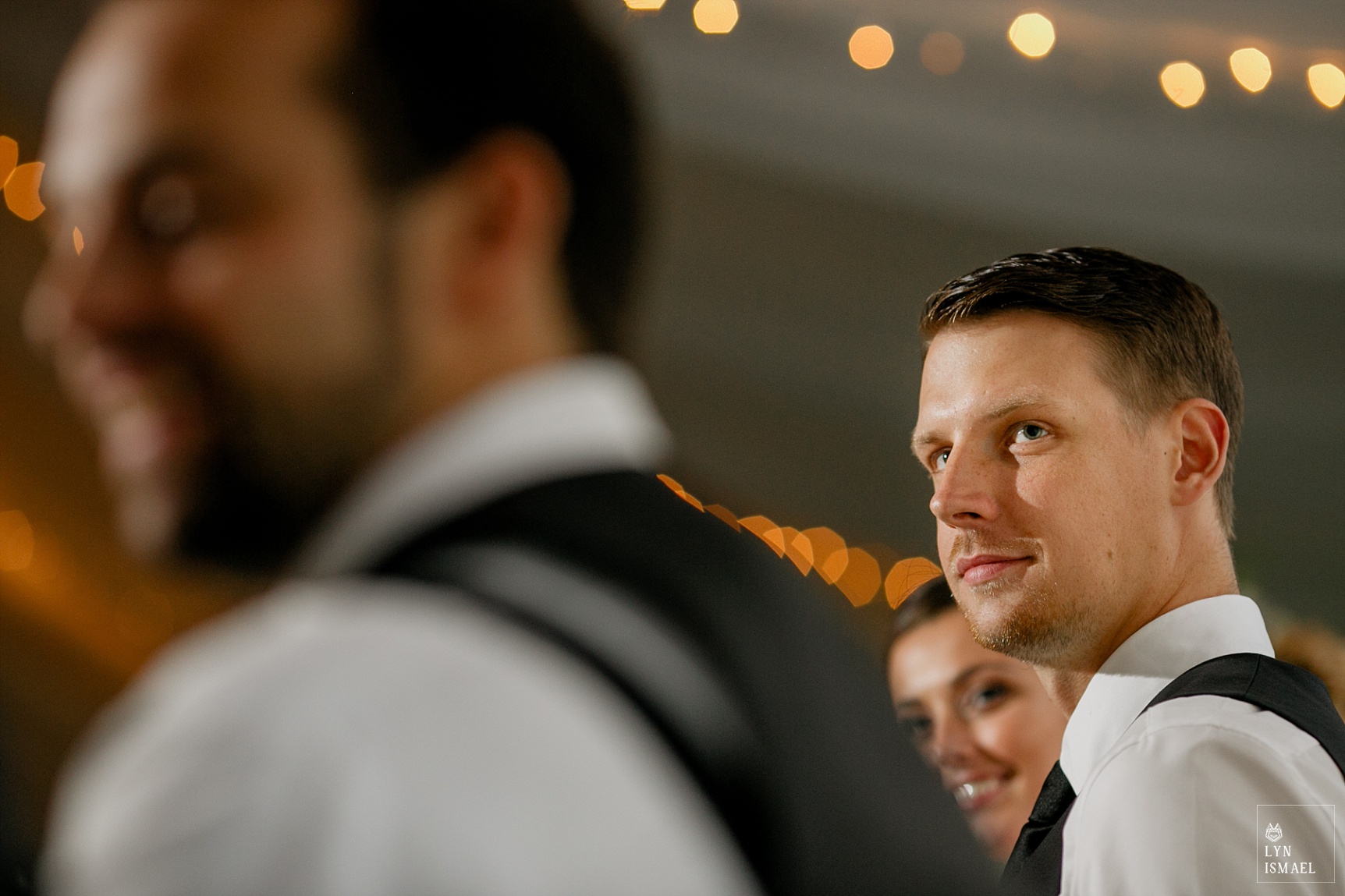 Groom listens to his best man's speech at his Knollwood Golf Club wedding reception