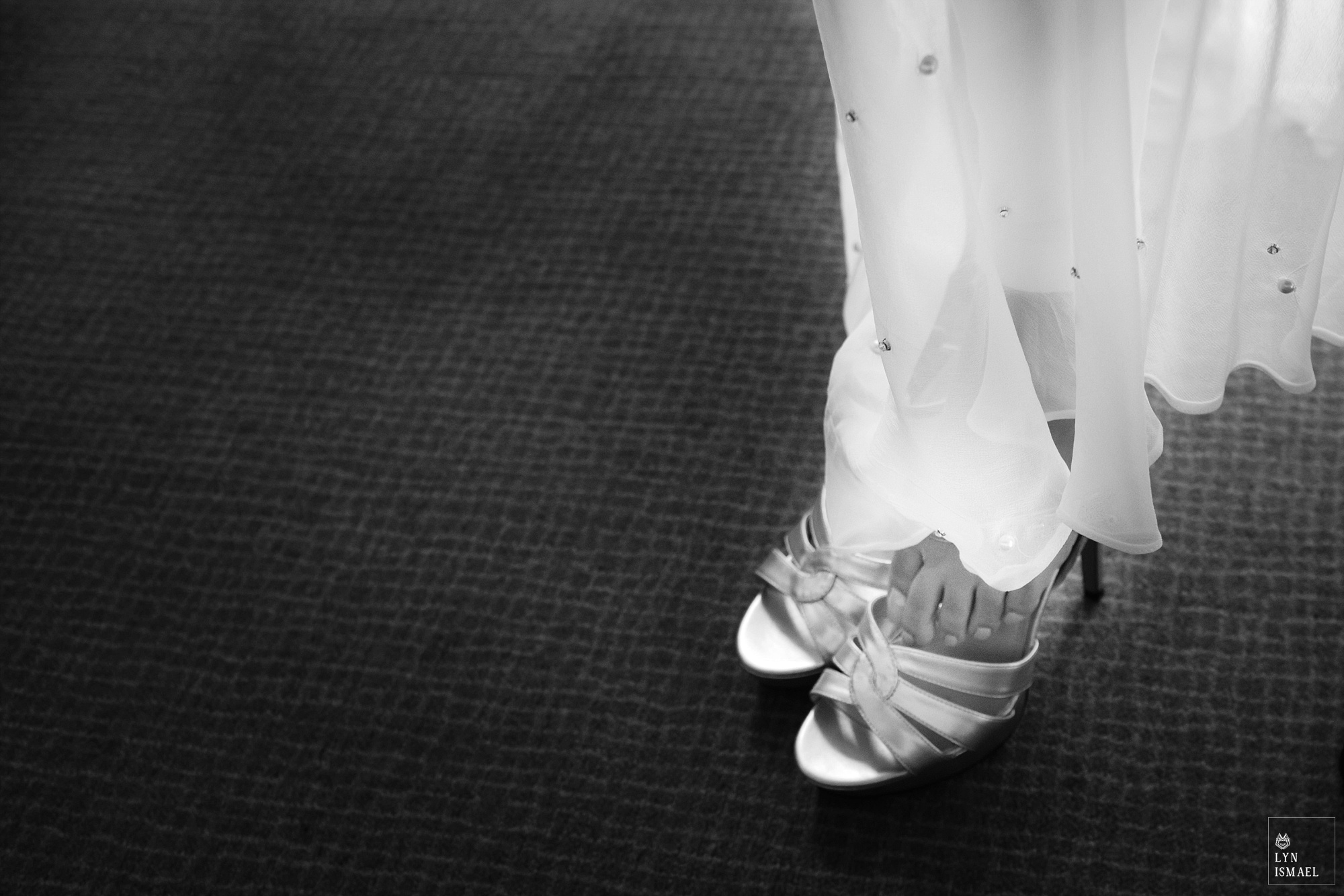 Bride puts on her shoes