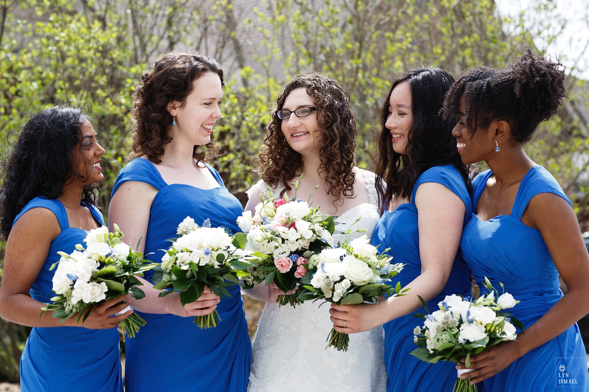 Bride and her bridesmaids at a wedding in Wellesley, Ontario.