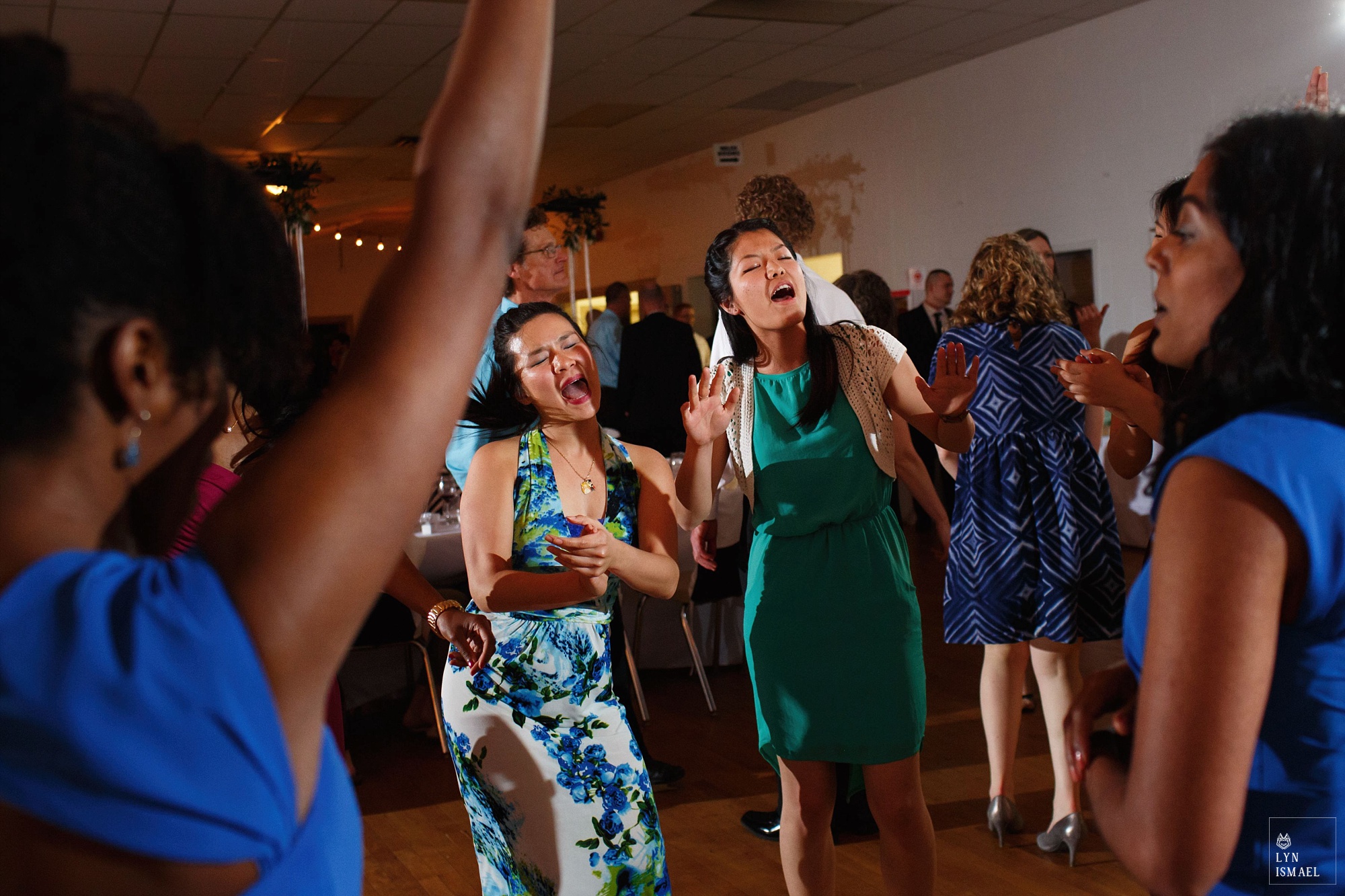 Wedding guests have fun on the dance floor at Wellesley Community Centre