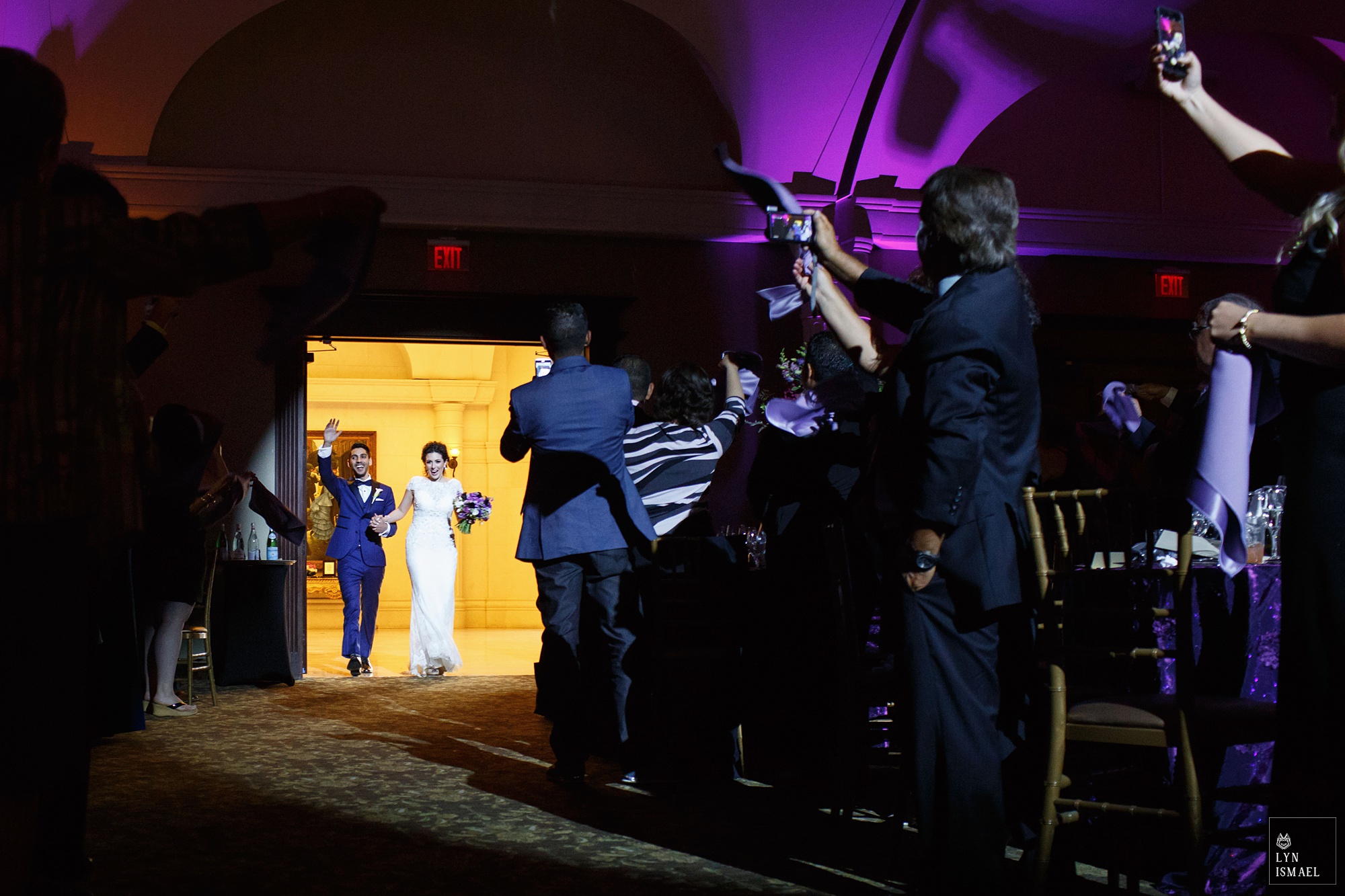 Bride and groom enters the reception hall of Bellvue Manor